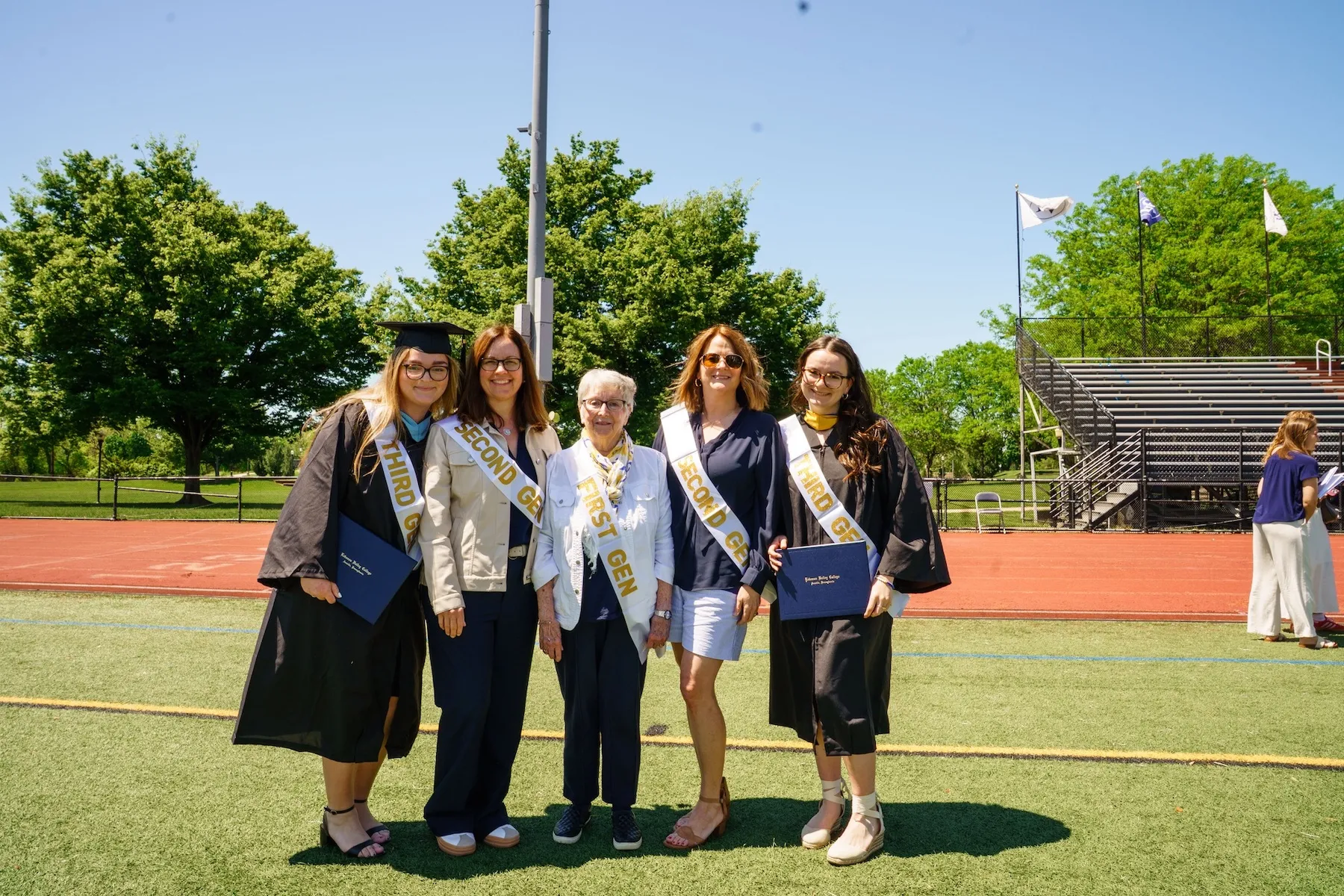 Family wears sashes marking first, second, and third generation at LVC Commencement 2025