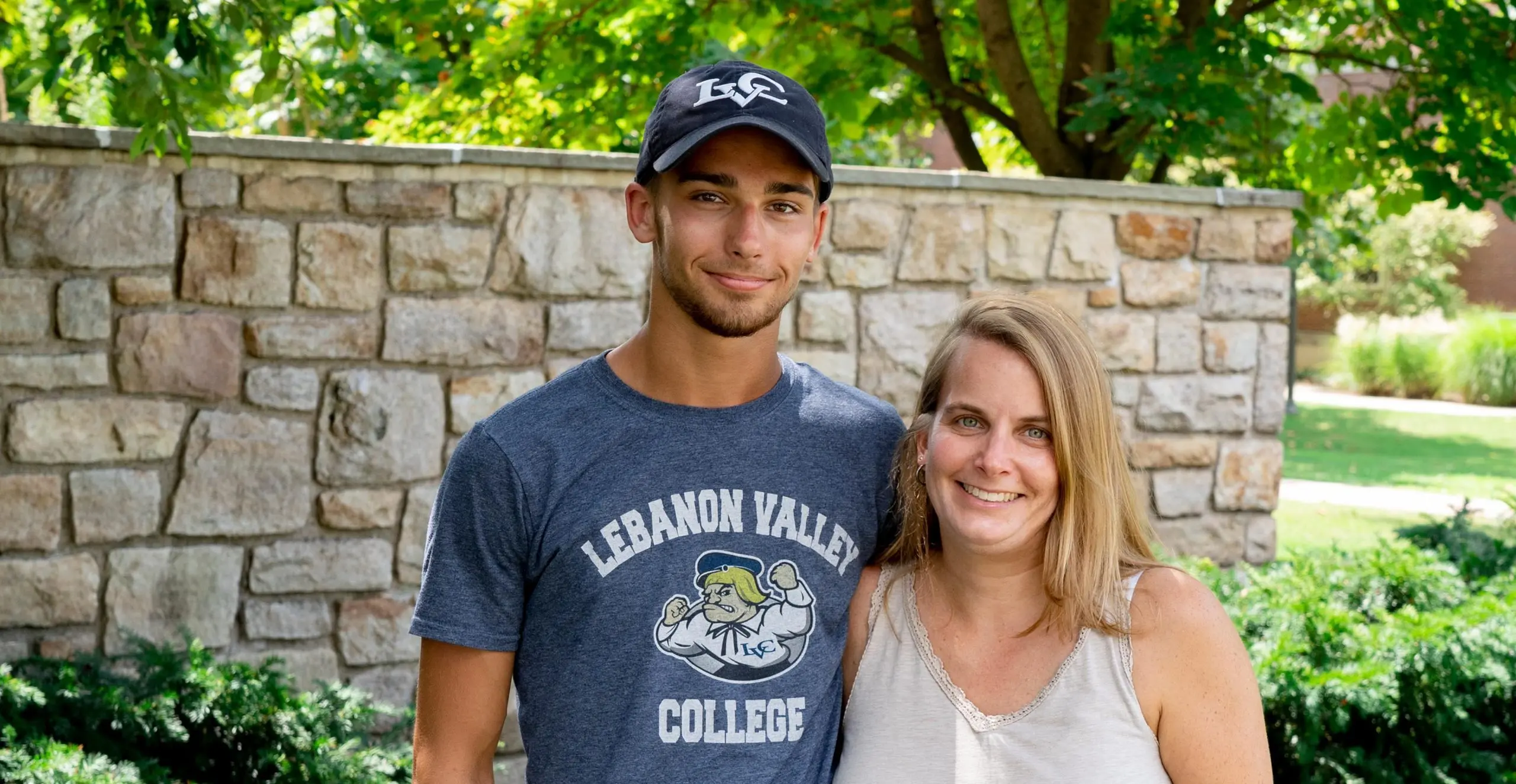 Student and parent smiling