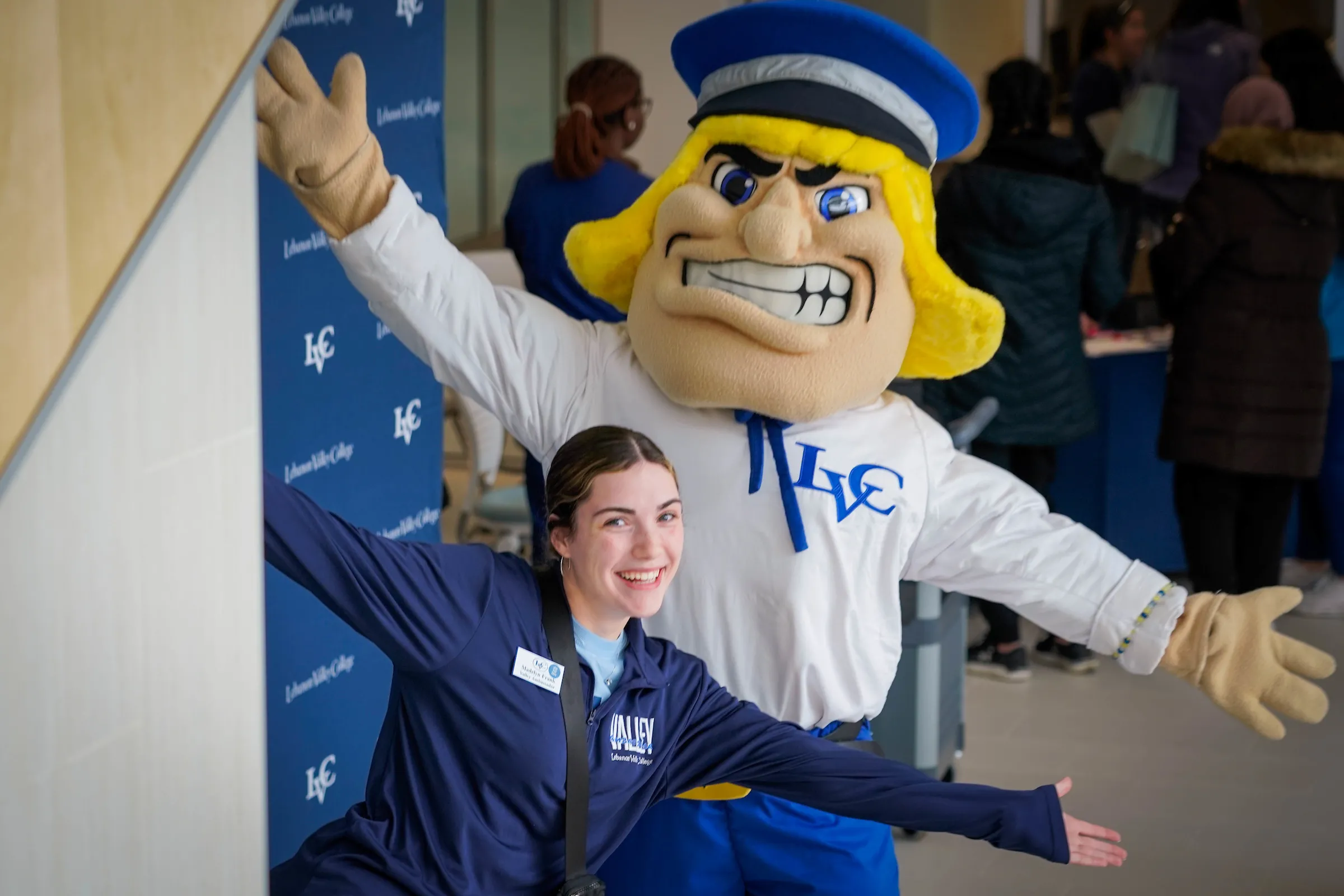 LVC Valley Ambassador poses with Dutchman mascot at LVC Live admitted student event