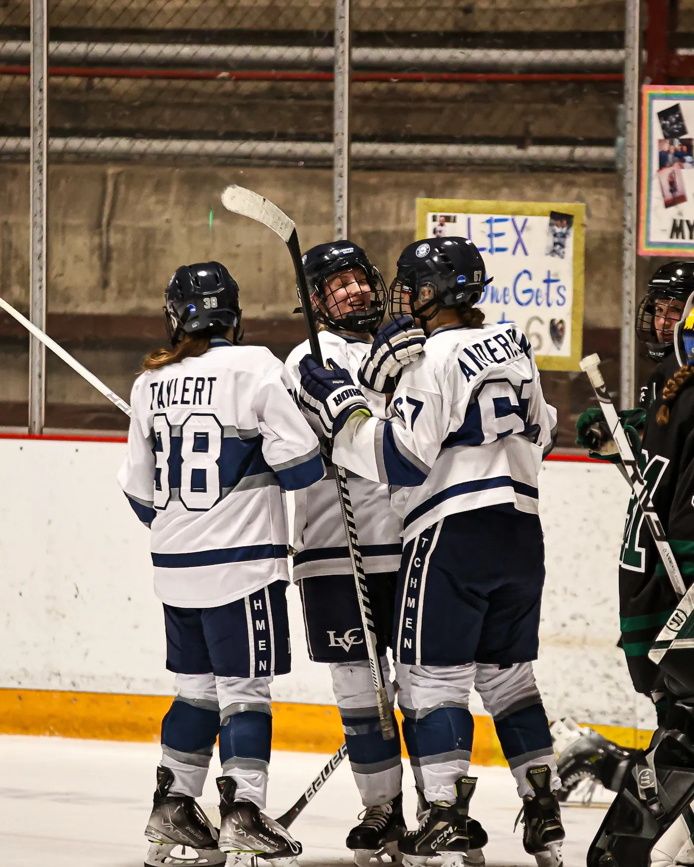 LVC women's ice hockey players celebrate on ice