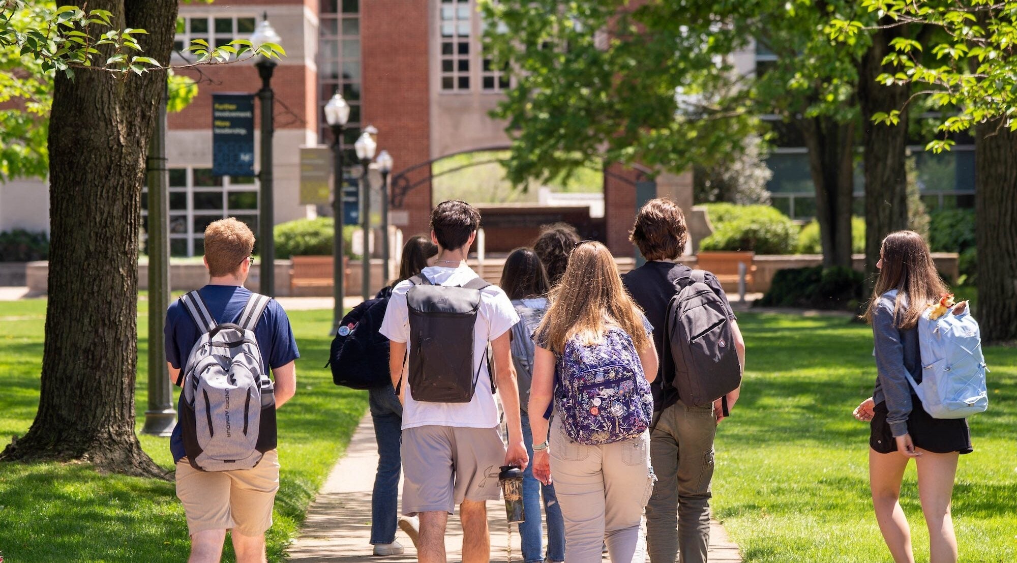 Students walk on LVC campus in spring