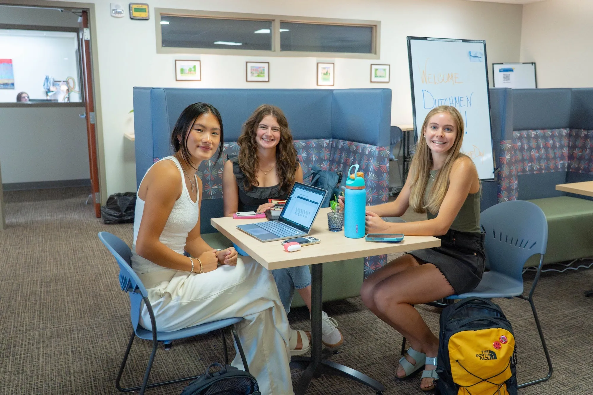 Students sit together in Center for Academic Success and Exploration