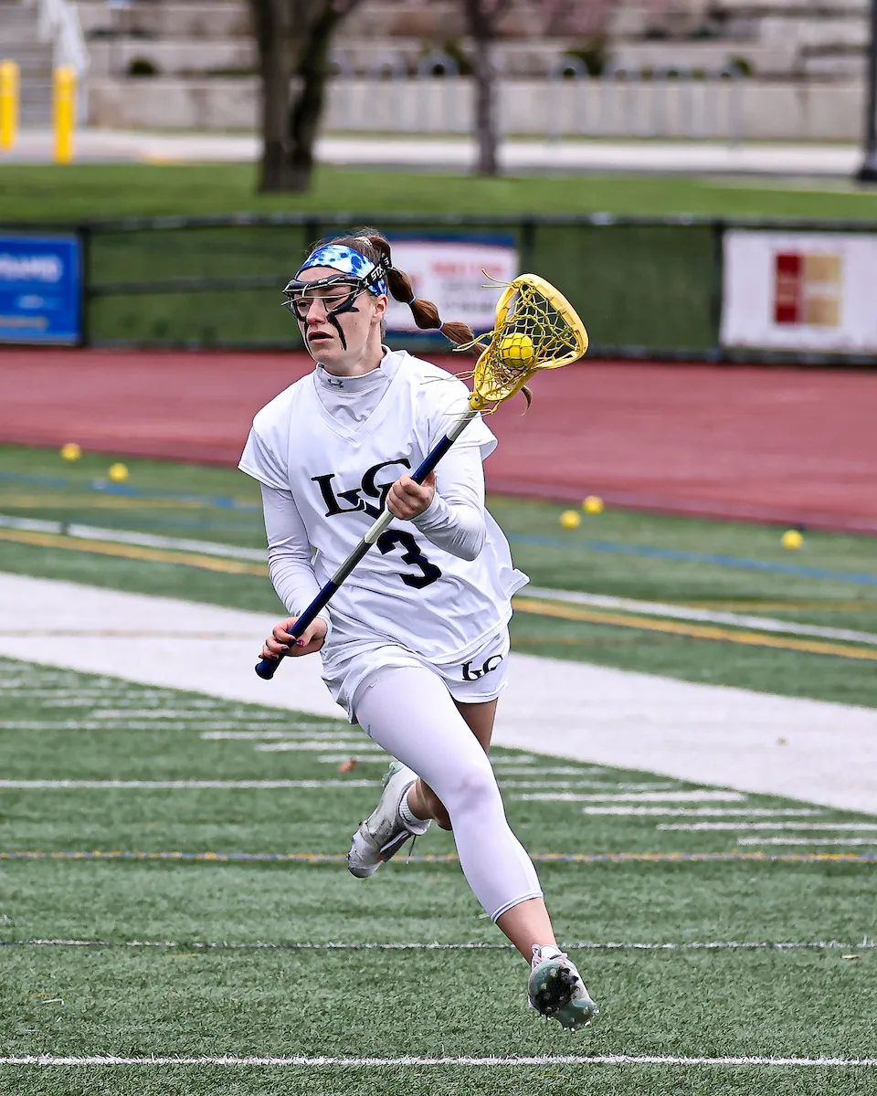 LVC women's lacrosse player on field