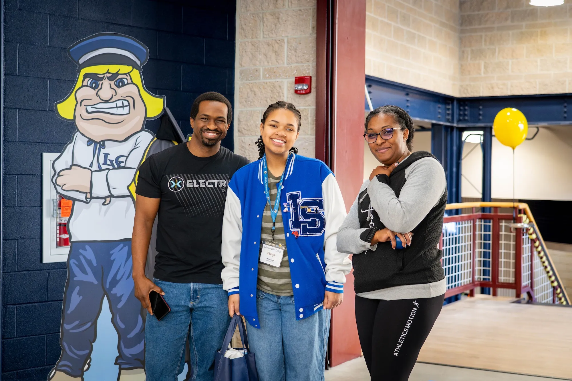 New student poses with family at LVC Live admitted student event