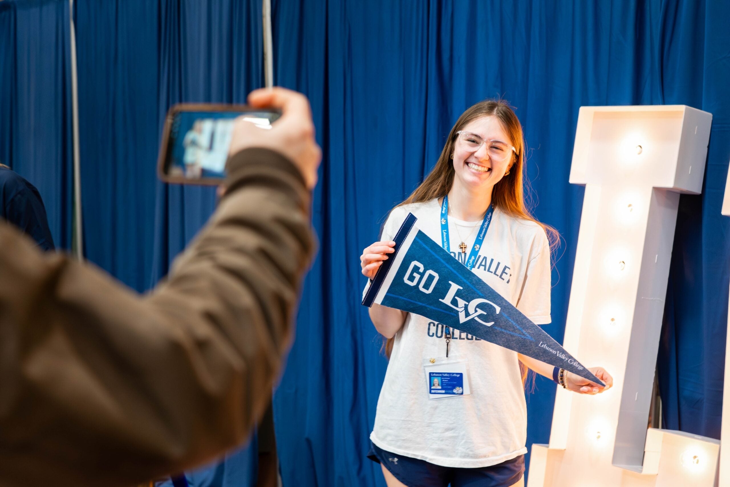 Newly enrolled student poses for photo at LVC Live admitted student event