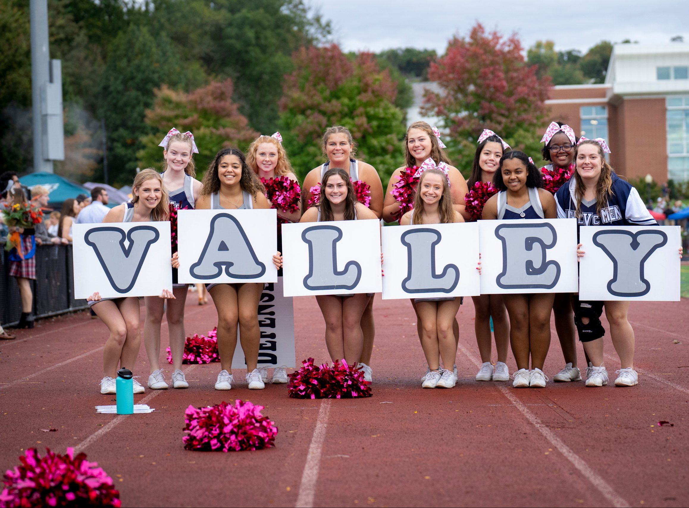 LVC cheerleaders hold VALLEY letters