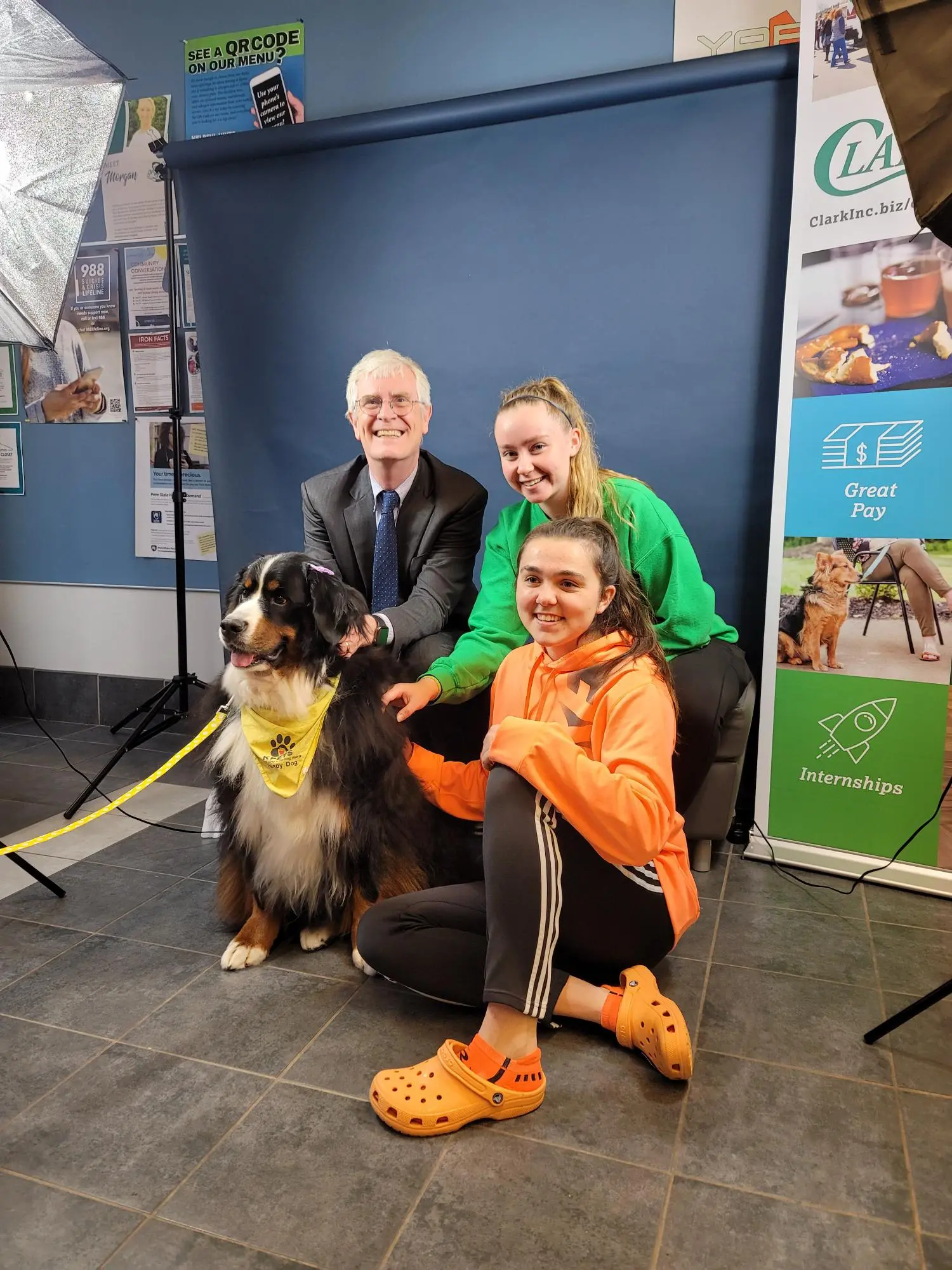 KPets team poses with dog and LVC President James MacLaren