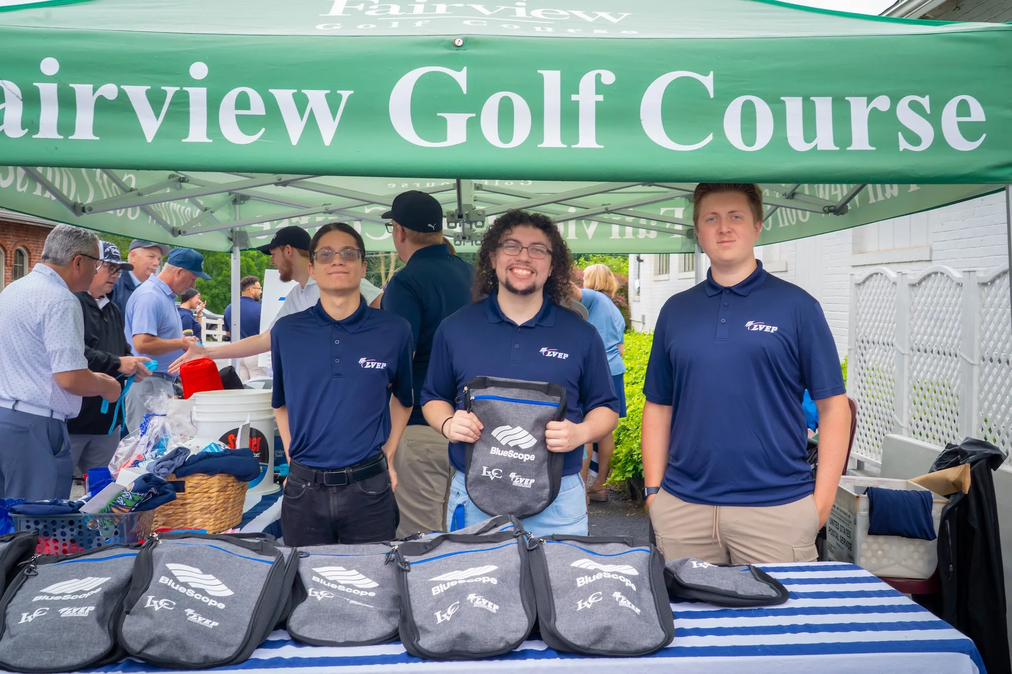 Students hand out swag at LVEP Golf Tournament