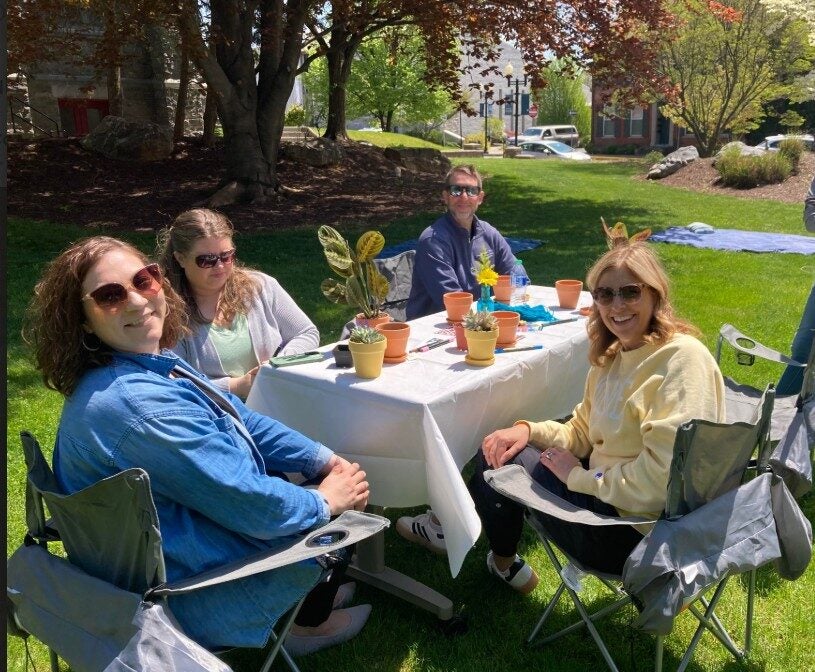 LVC staff at plants table at Campus Family First Annual Dutchmen Day