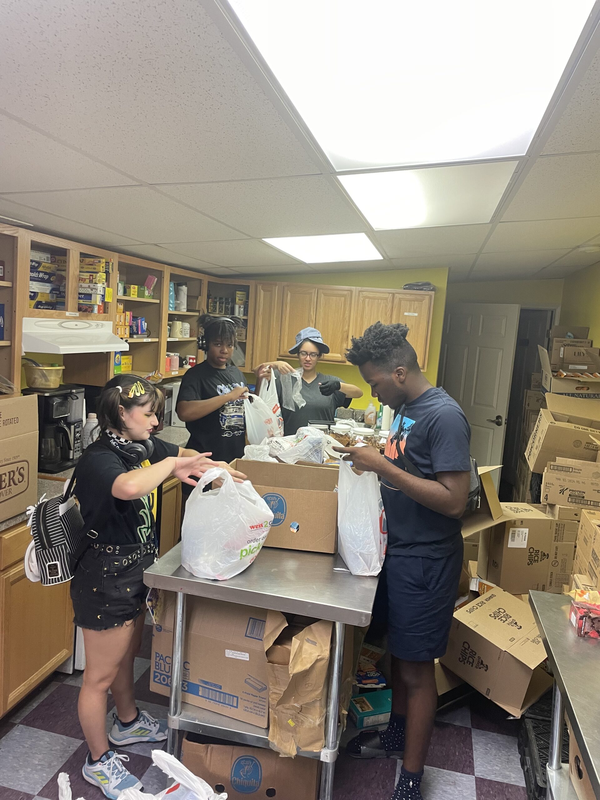 LVC Summer Enrichment Program students volunteer at the Caring Cupboard