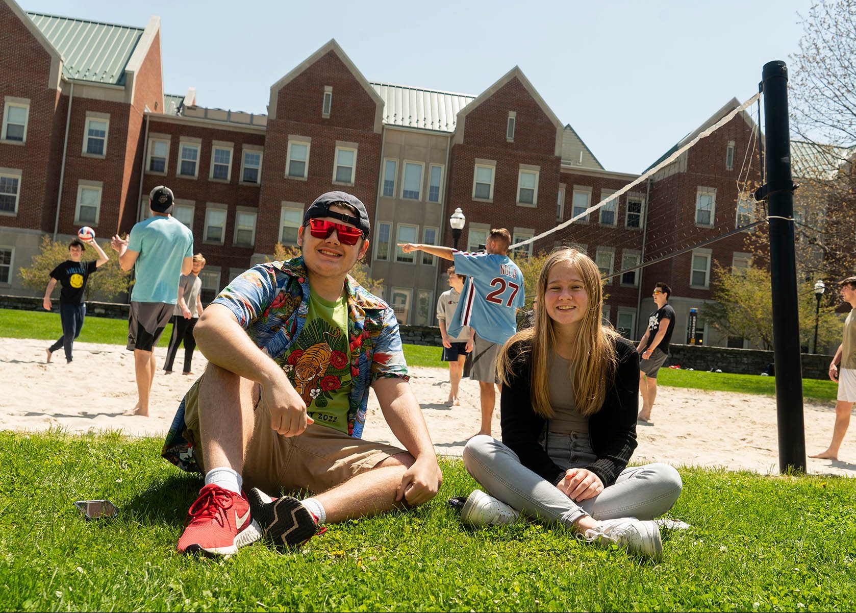 Two students sitting on campus