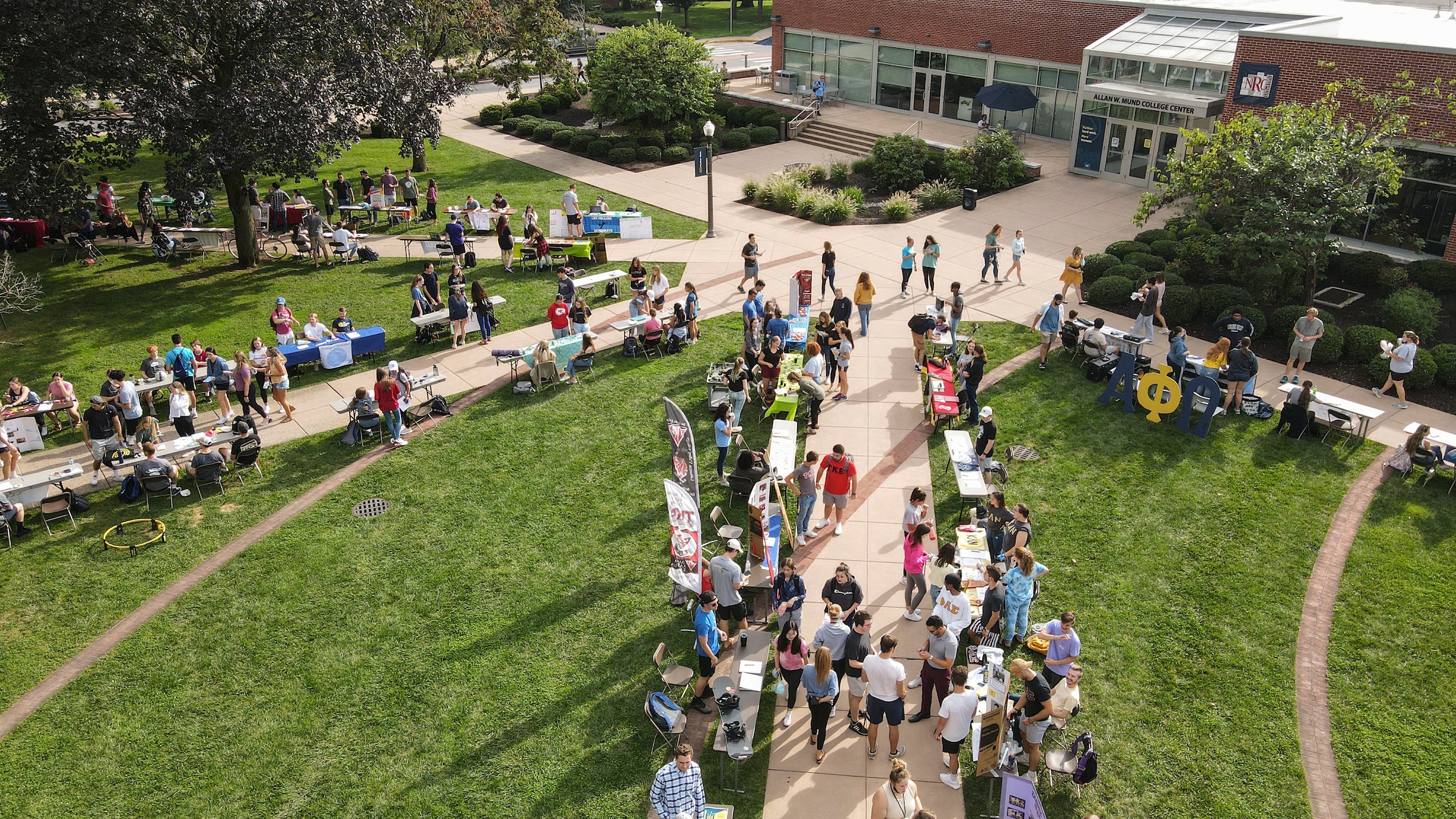 Aerial view of students visiting tables at engagement fair on the LVC campus