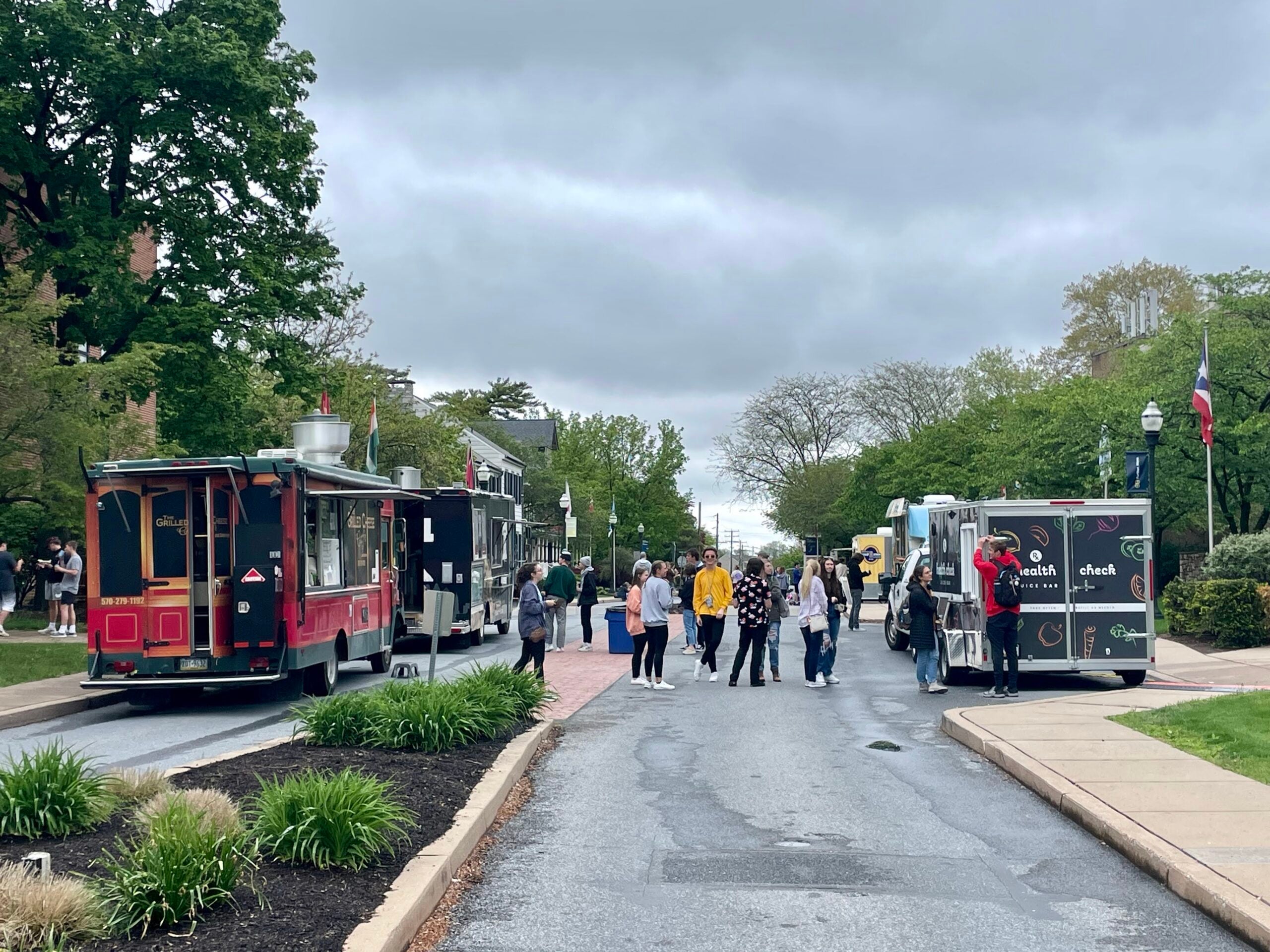 Students visit food trucks on campus during Valley Fest