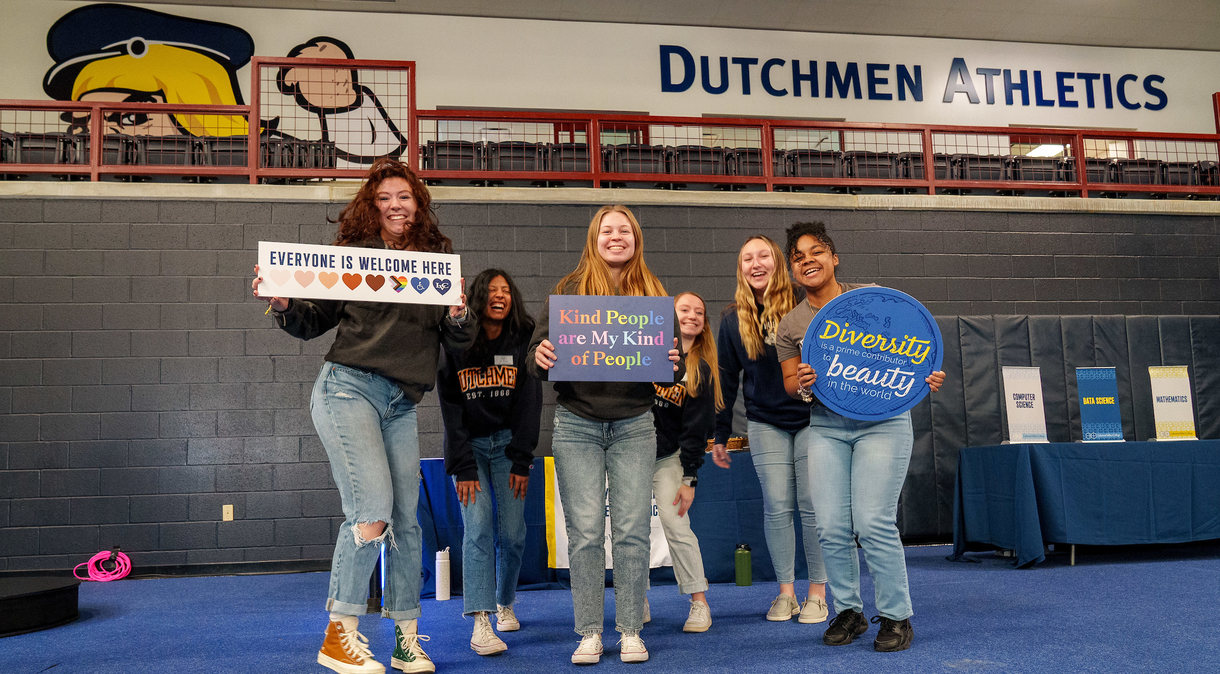 LVC students hold diversity signs at accepted student event