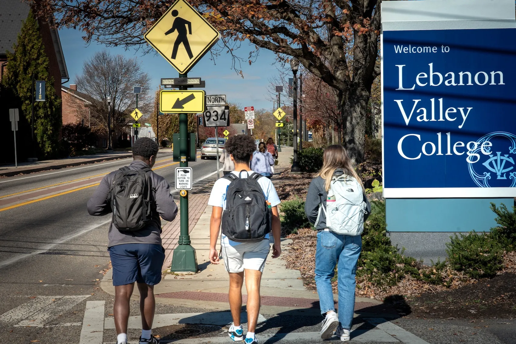 Students walk through downtown Annville in November 2024