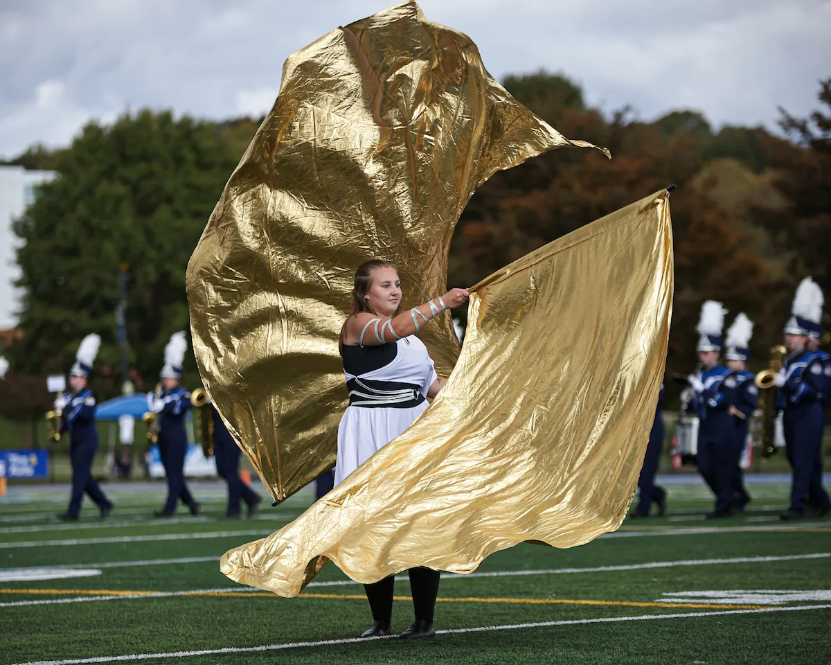 LVC Pride of the Valley Marching Band member with flags