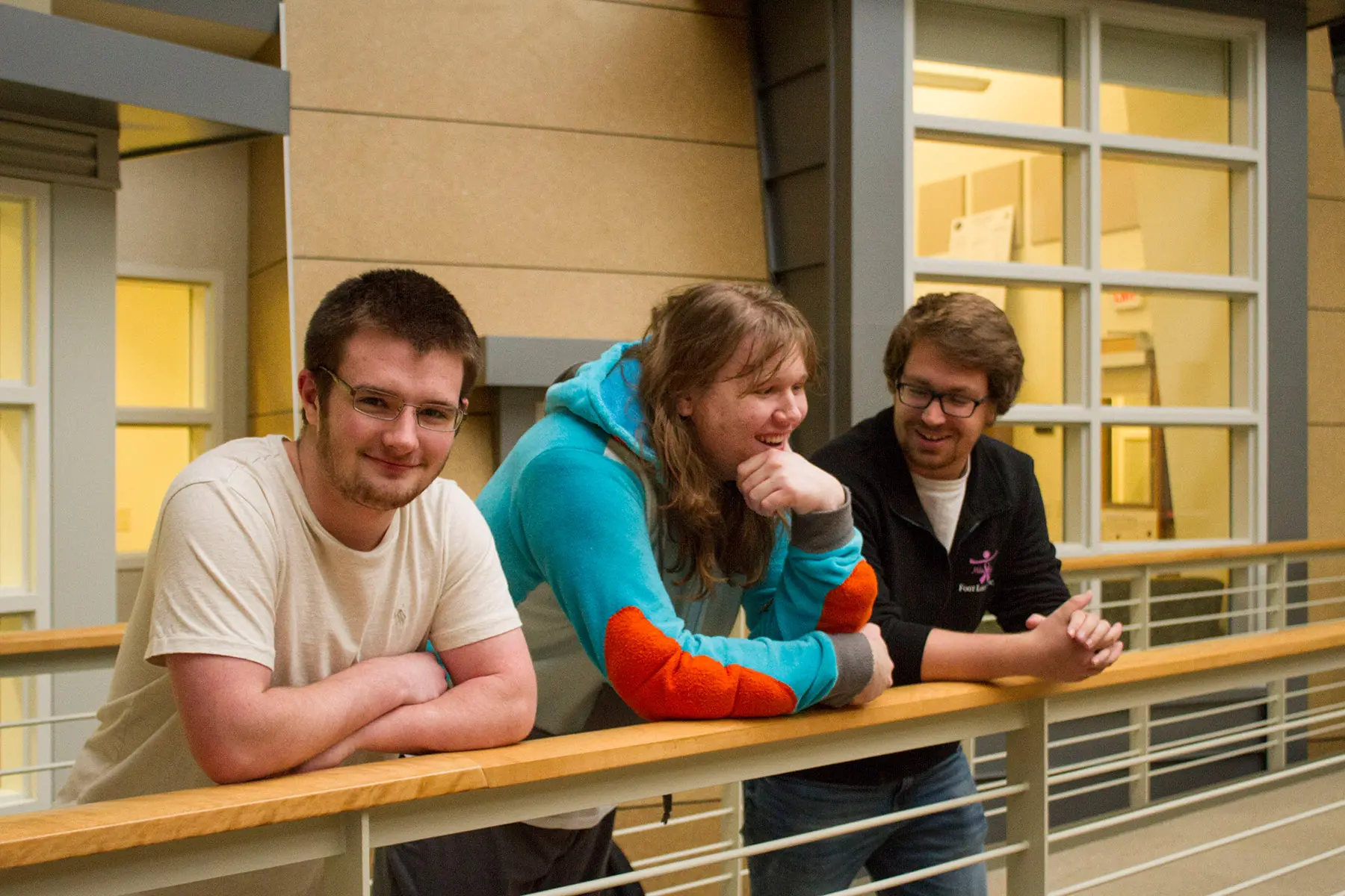 Math students posing outside a math classroom.