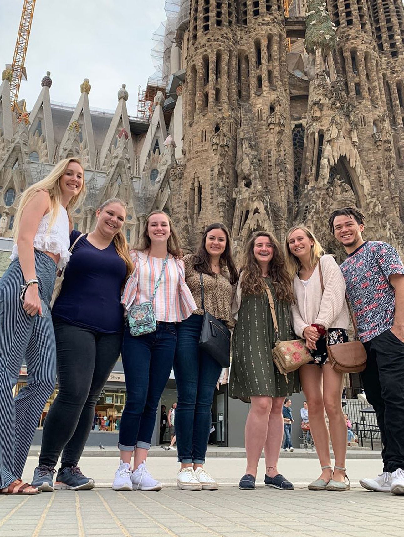 Students studying abroad pose in front of La Sagrada Familia.