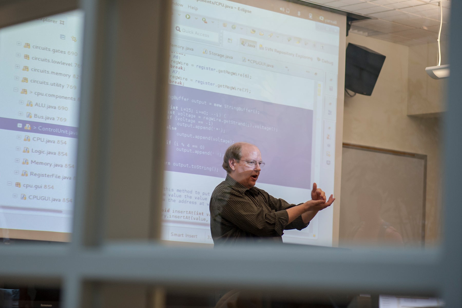 Professor teaching in computer lab