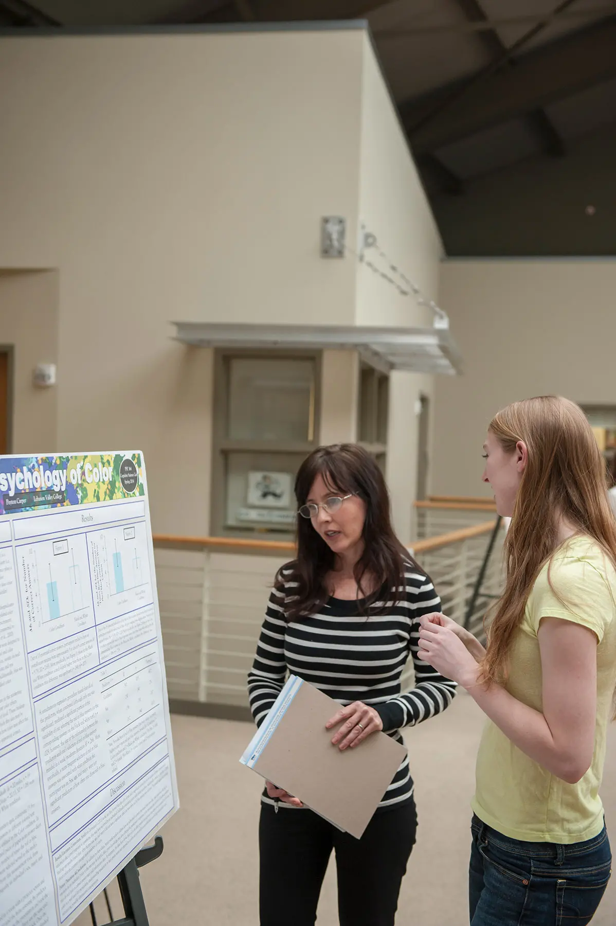 Psych student looking at display board