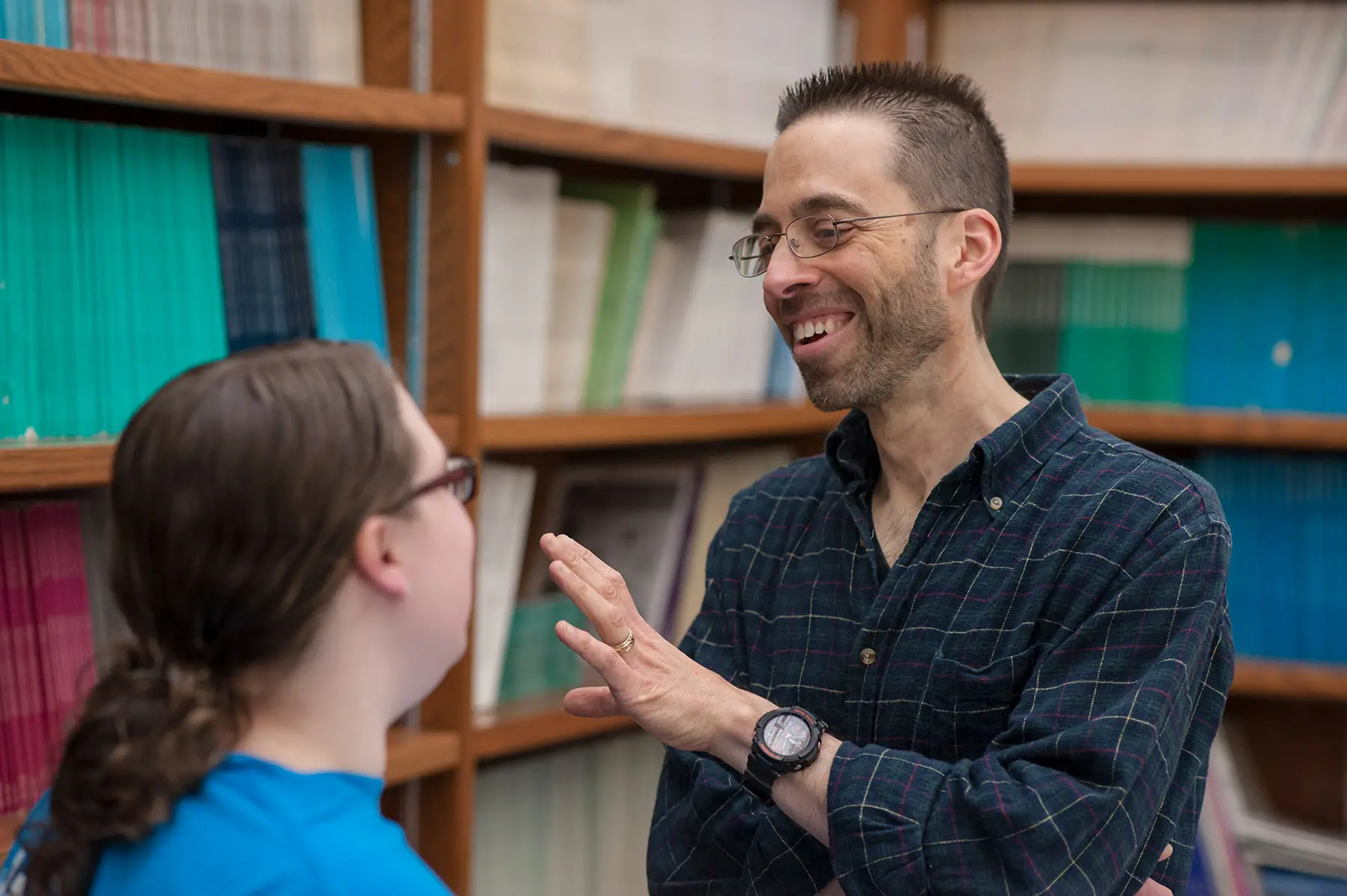 Professor speaking to student