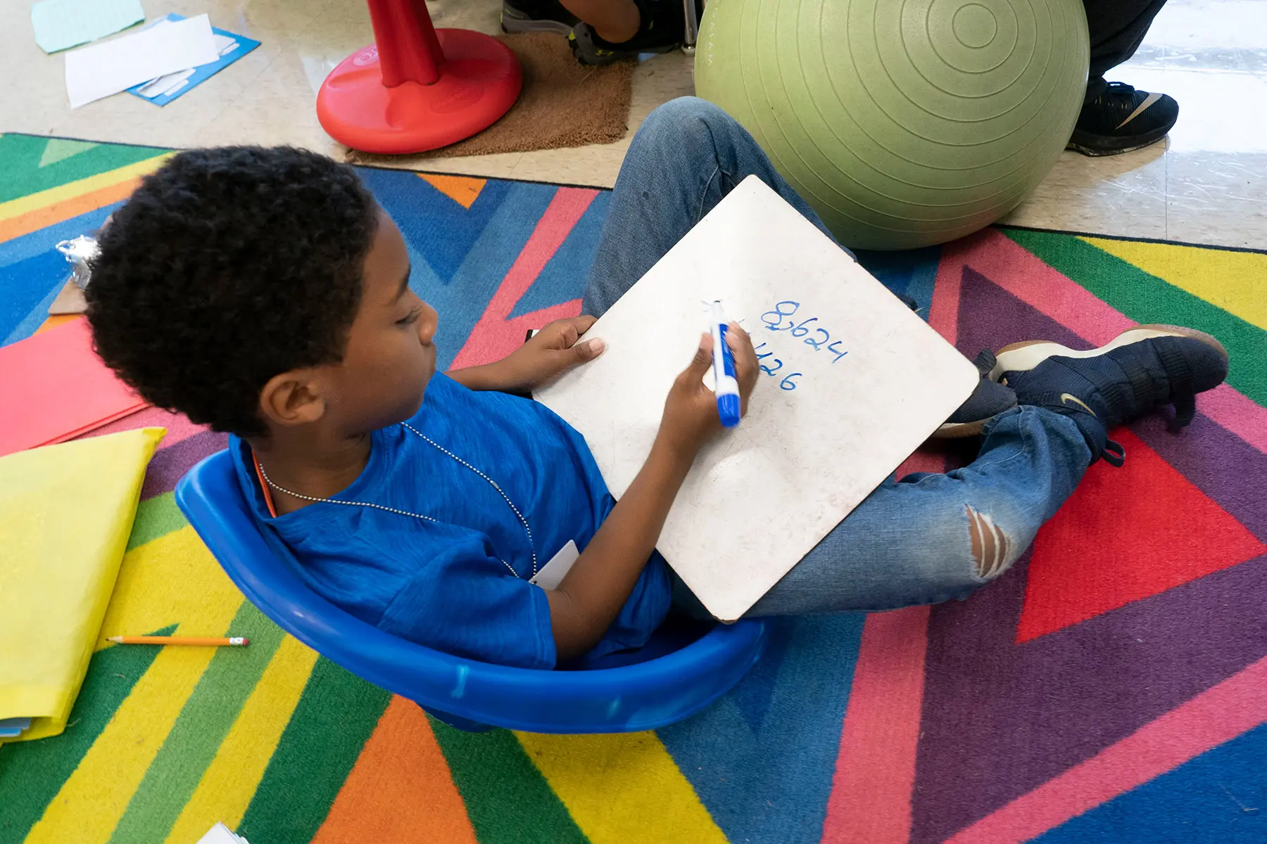 Little boy reading a picture book