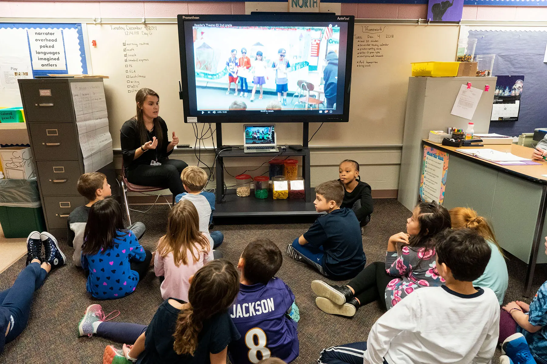 Students listening to student teacher