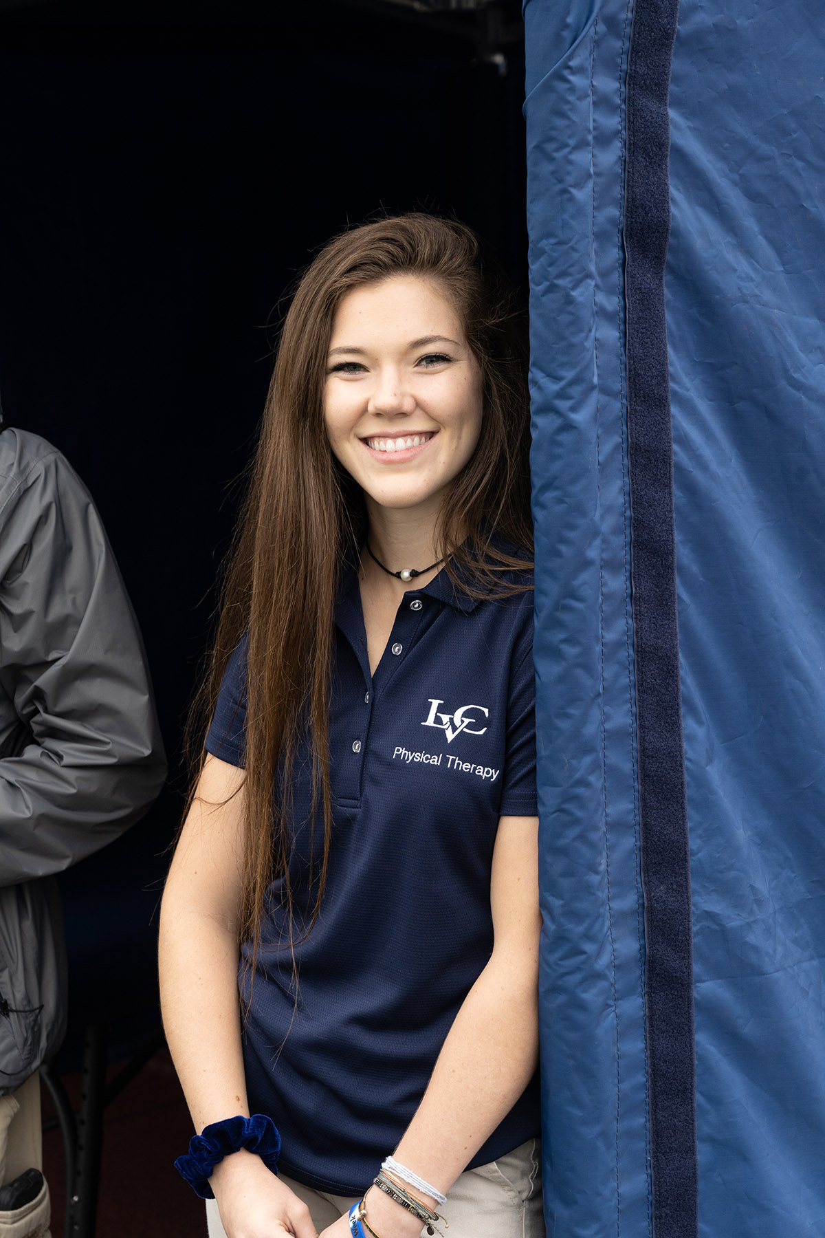 physical therapy program student pictured in blue shirt with LVC Physical Therapy logo