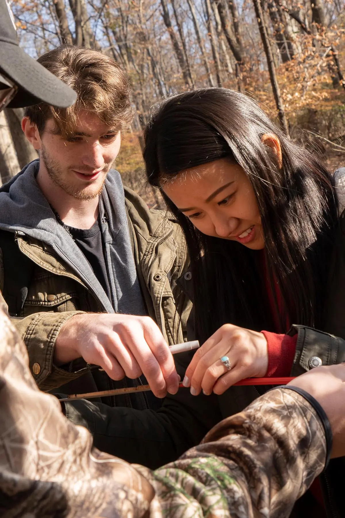 Students collecting specimens during field research