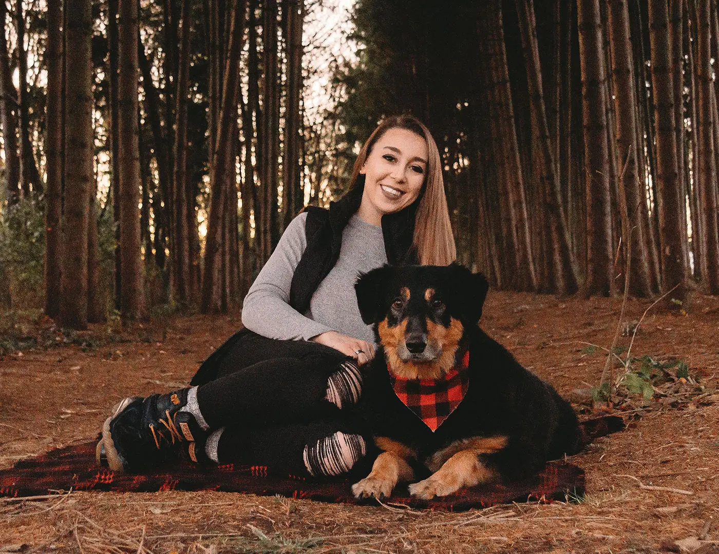 Chris Ware poses with her dog