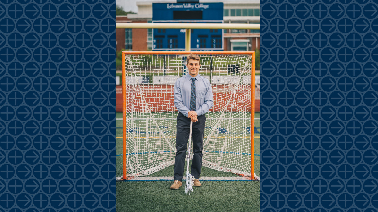 Matthew Torrence in front of lacrosse net