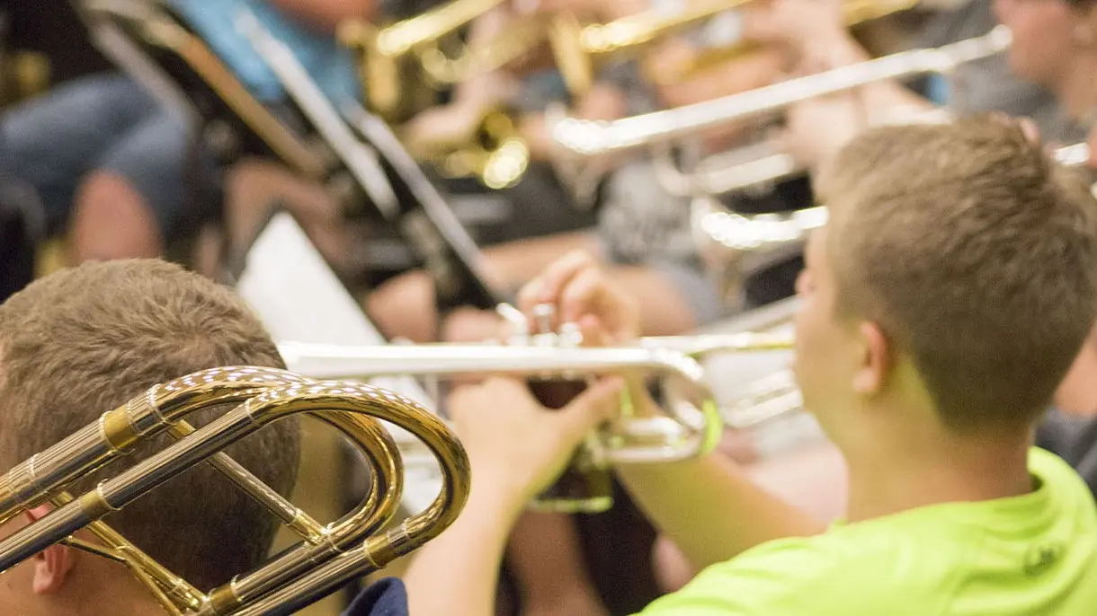 Students playing trumpet