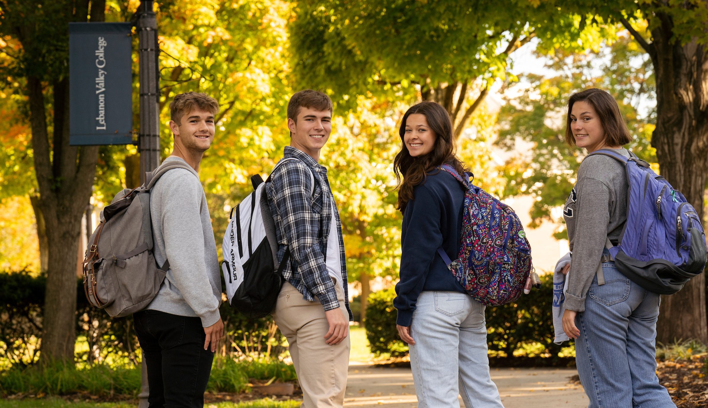 Students turn and smile for camera on LVC campus