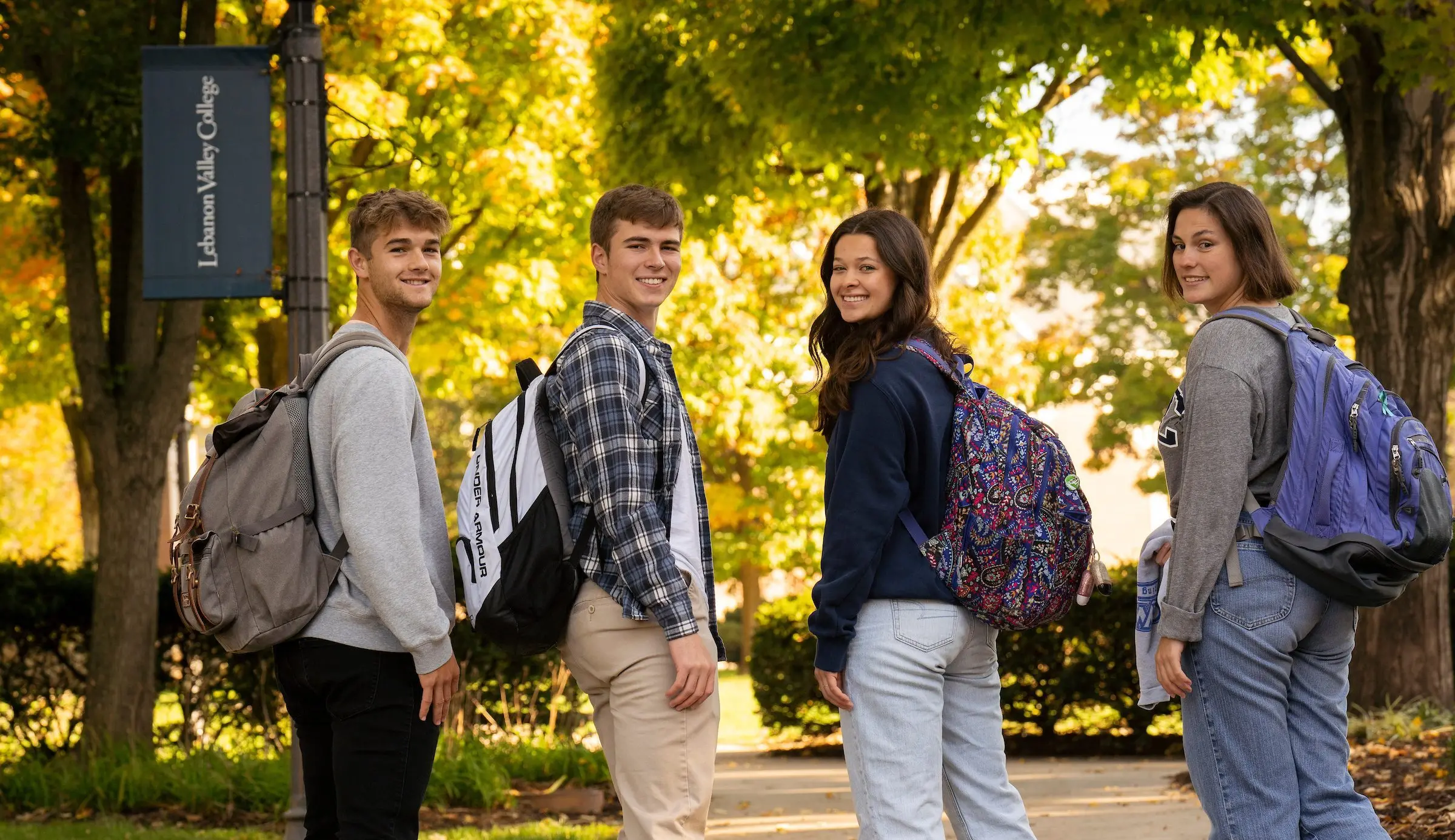 Students turn and smile for camera on LVC campus