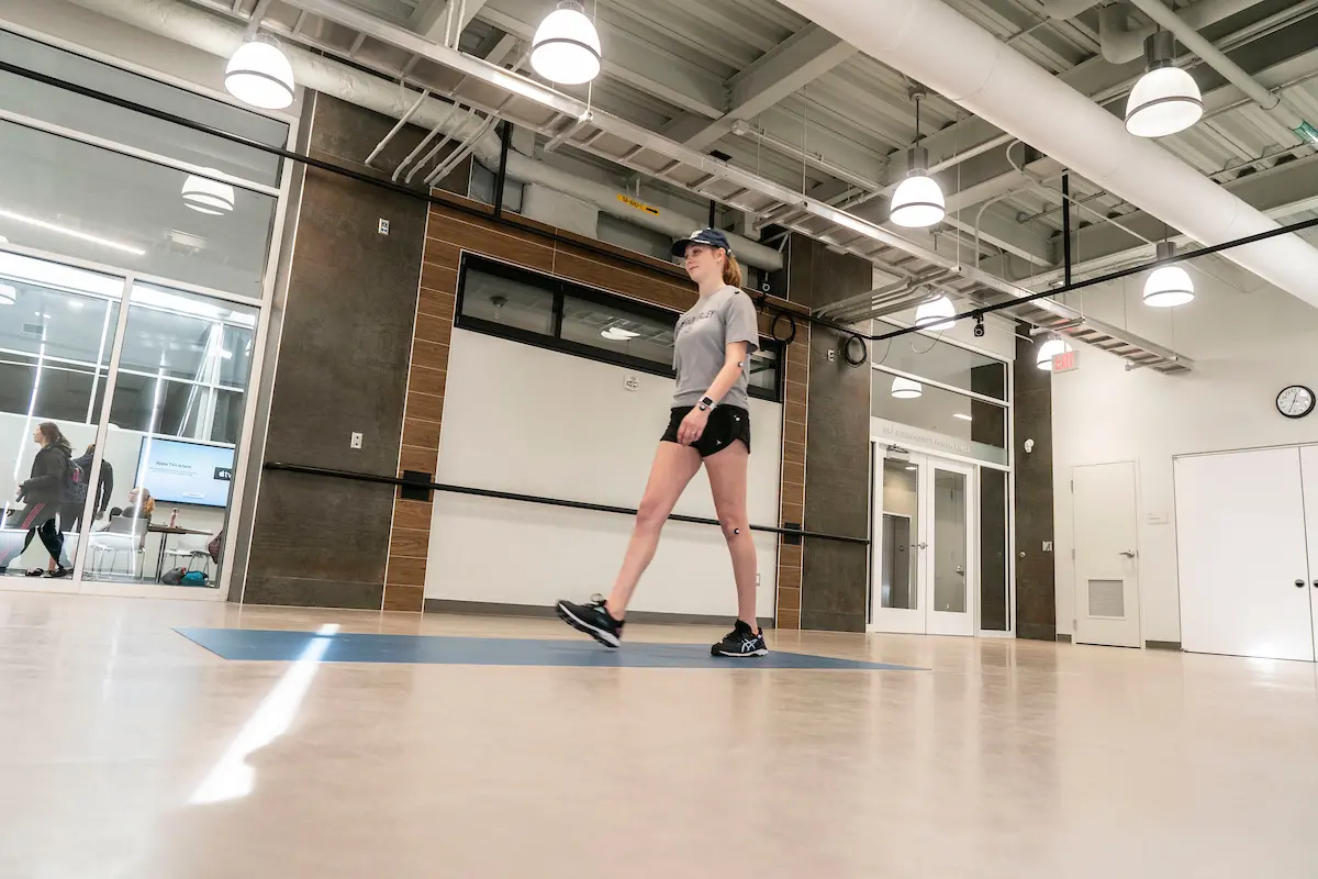 Exercise science student walks for 3D motion capture system
