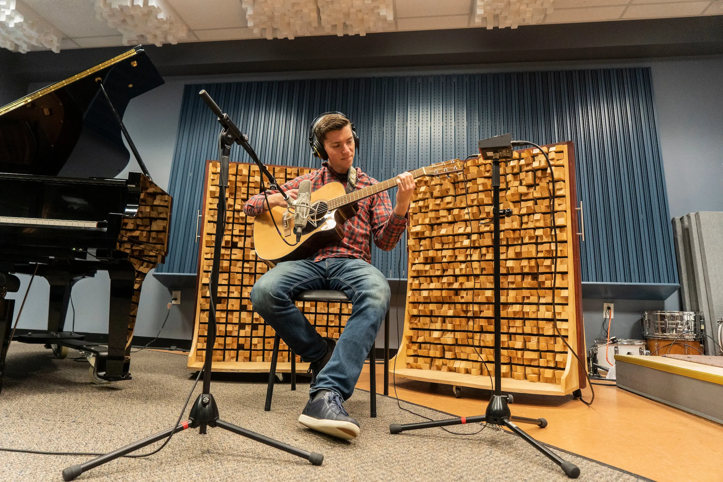 A student using analog recording equipment in Studio A at LVC