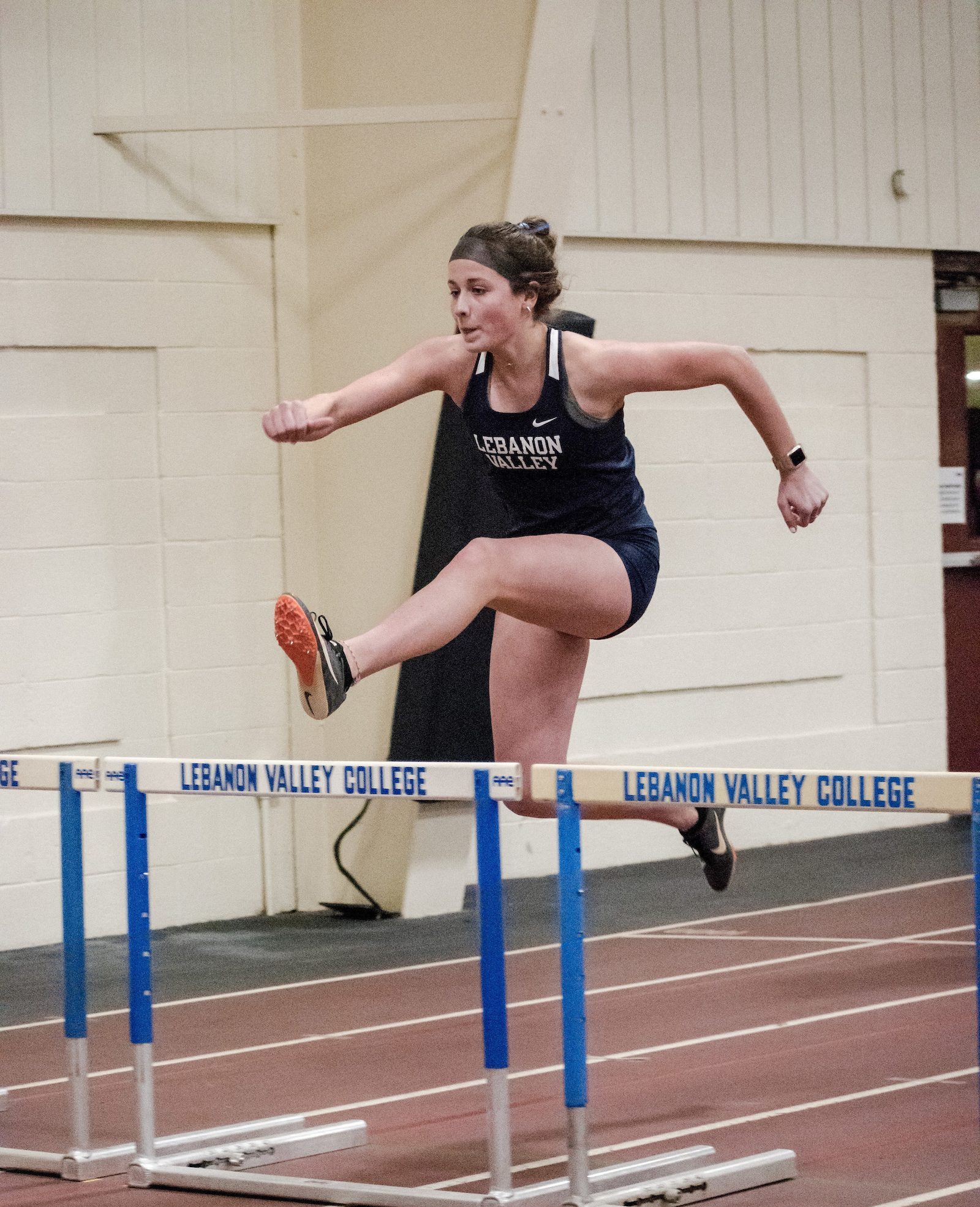 Olivia Sensenig jumps hurdle at Dutchman Invitational