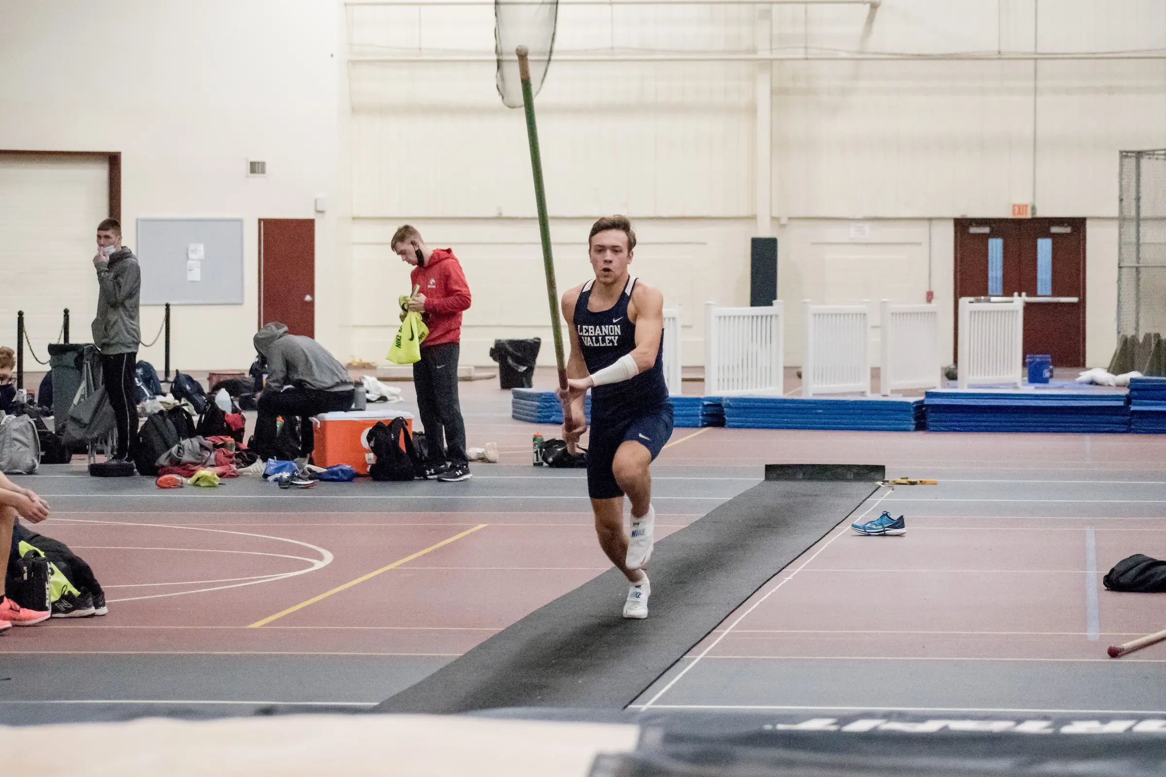 Darren Rodoff runs with pole at Dutchman Invitational track meet