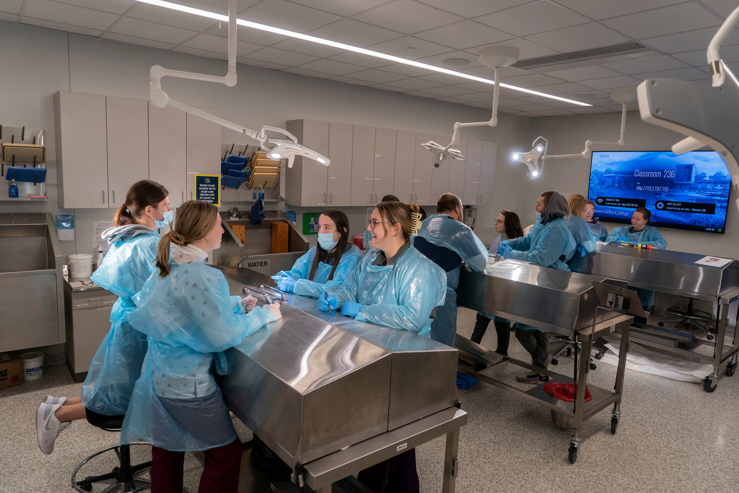 Athletic training students sit at tables in cadaver lab at LVC