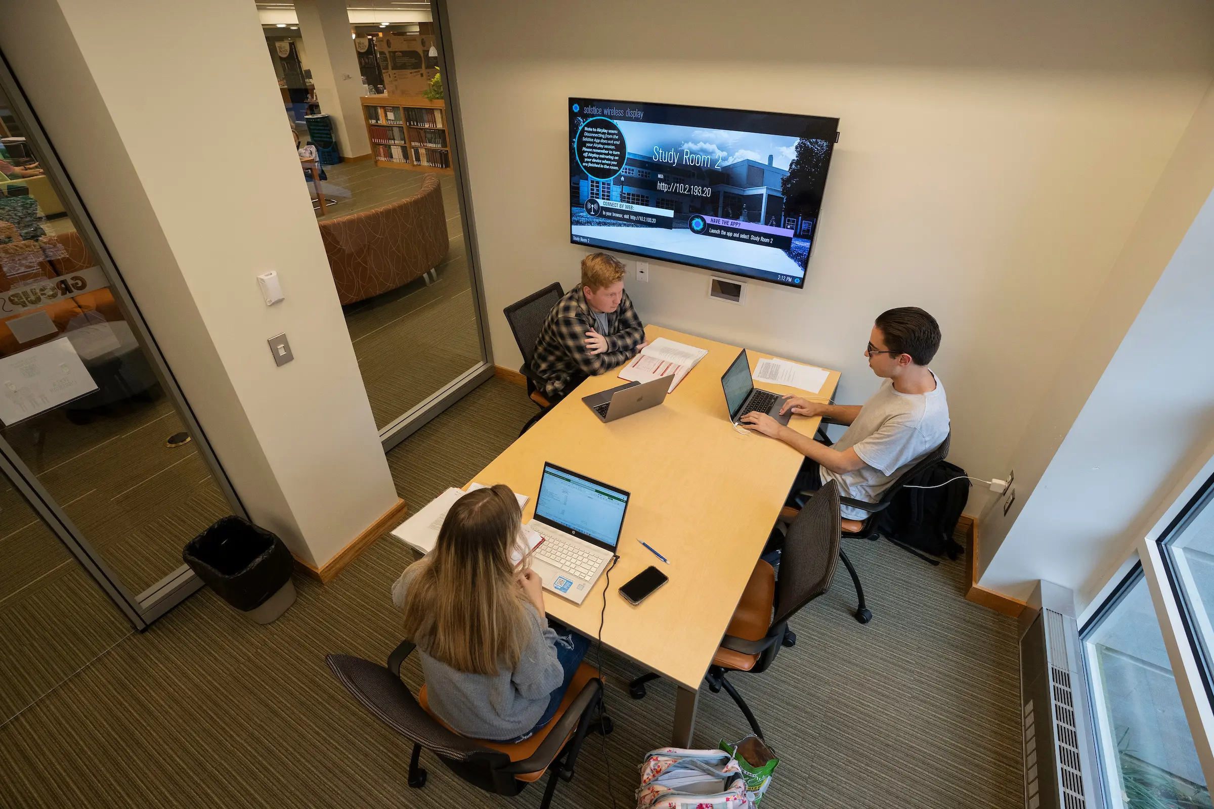 Students meet in library study room