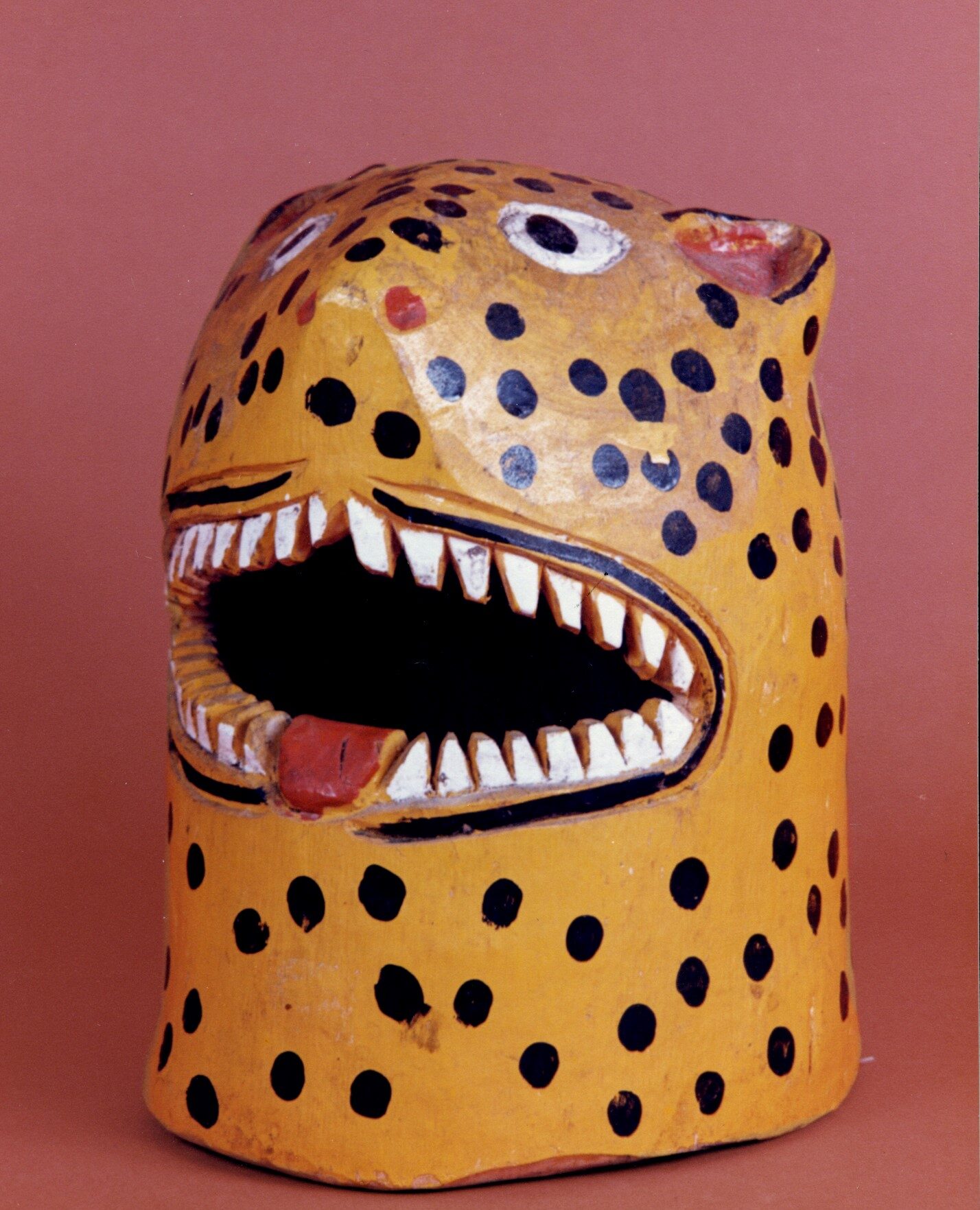 Helmet Mask: Head of el Tigre, paint on wood, 10 inches, region: Guerrero, Althouse Collection