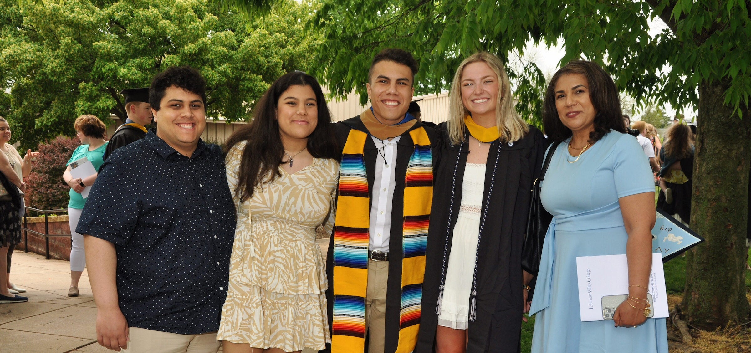 Family poses with graduates at 2022 LVC Commencement
