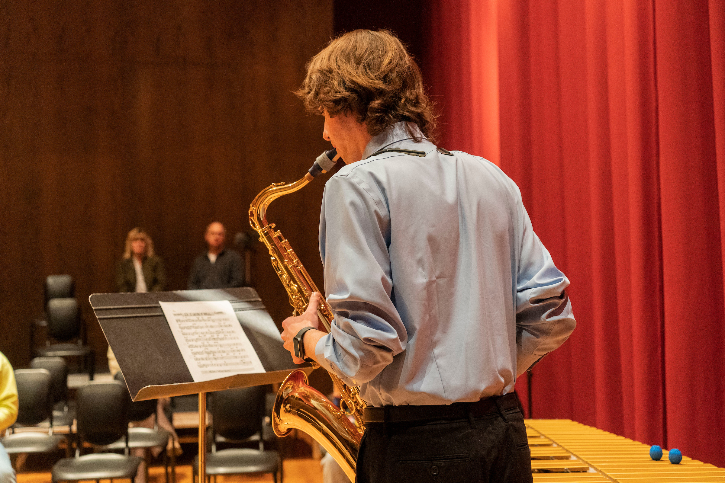 Student plays saxophone during common hour jazz performance
