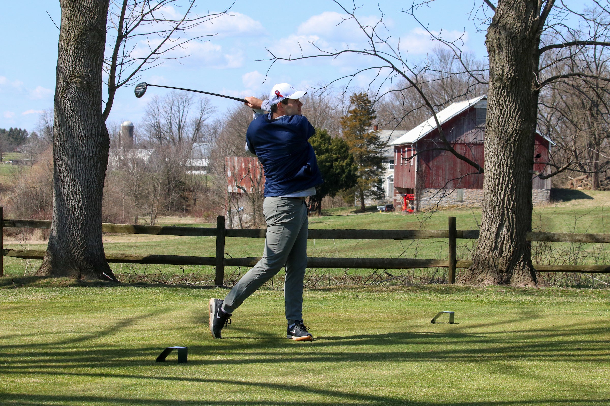 Mark Kishko swings club for LVC men's golf