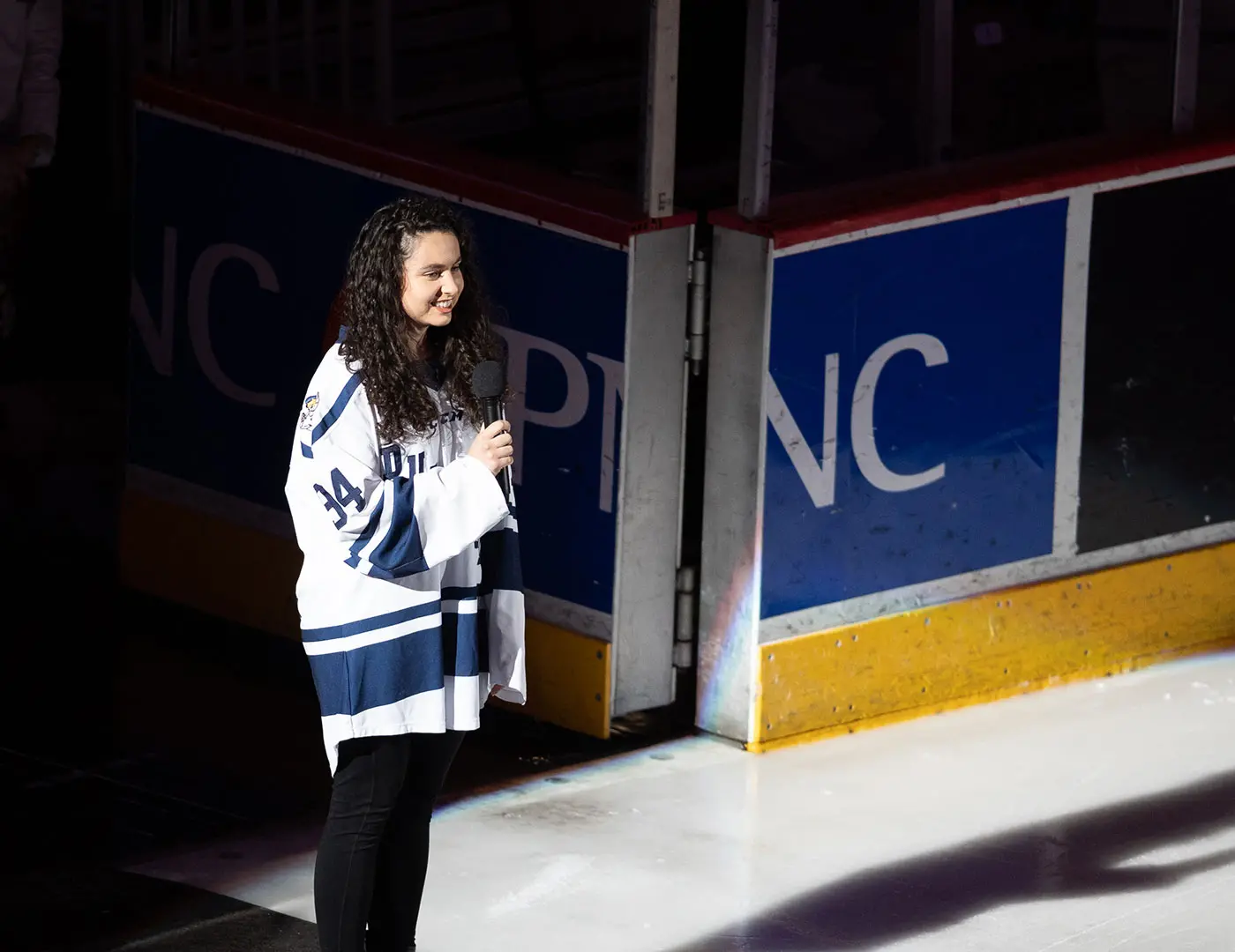 Physical therapy major Tate Murphy sings the national anthem at a Hershey Bears game