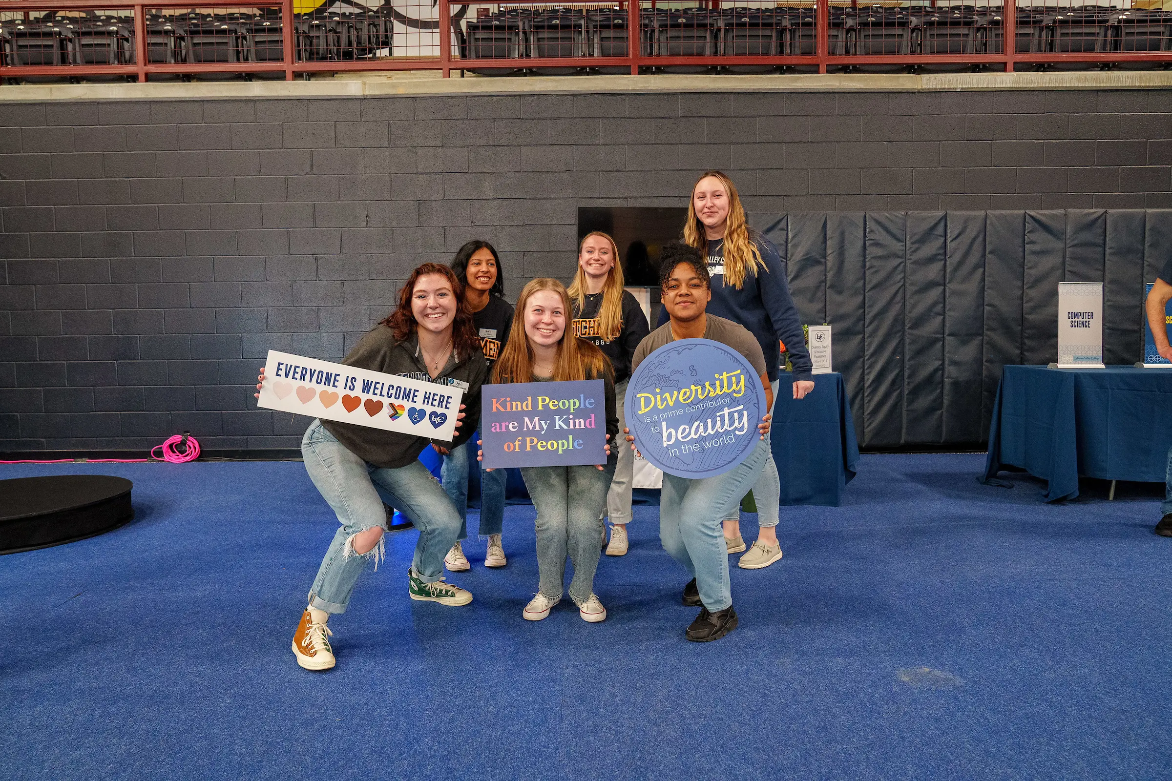 LVC students hold diversity signs at accepted student event
