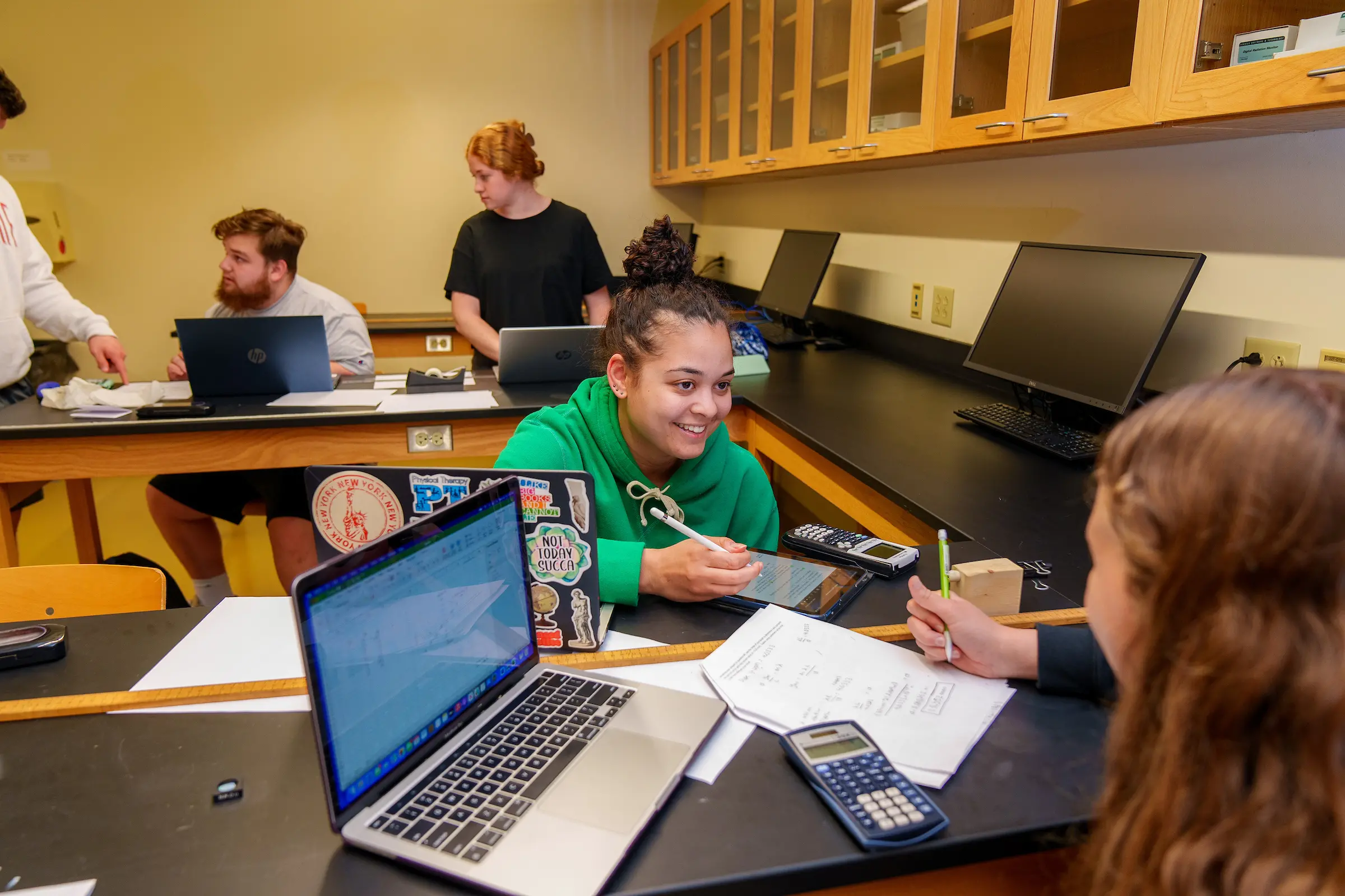 Students in physics lab class