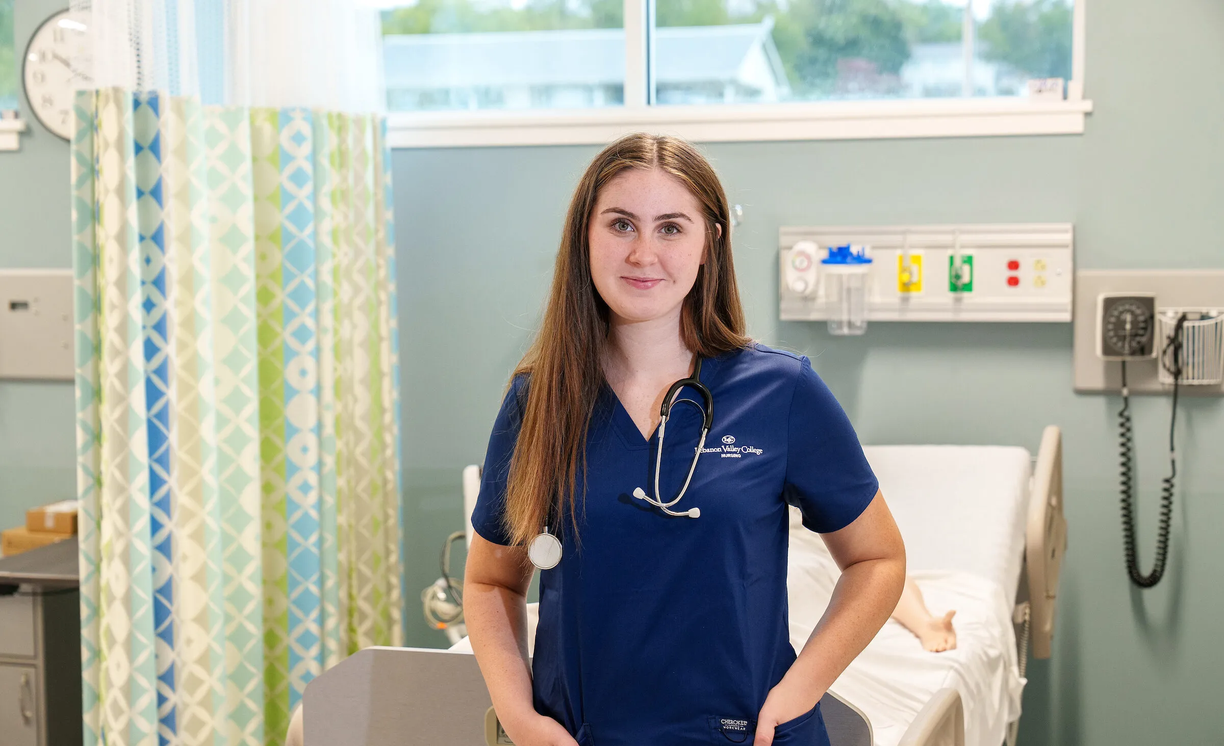 LVC nursing student wearing scrubs in simulation lab