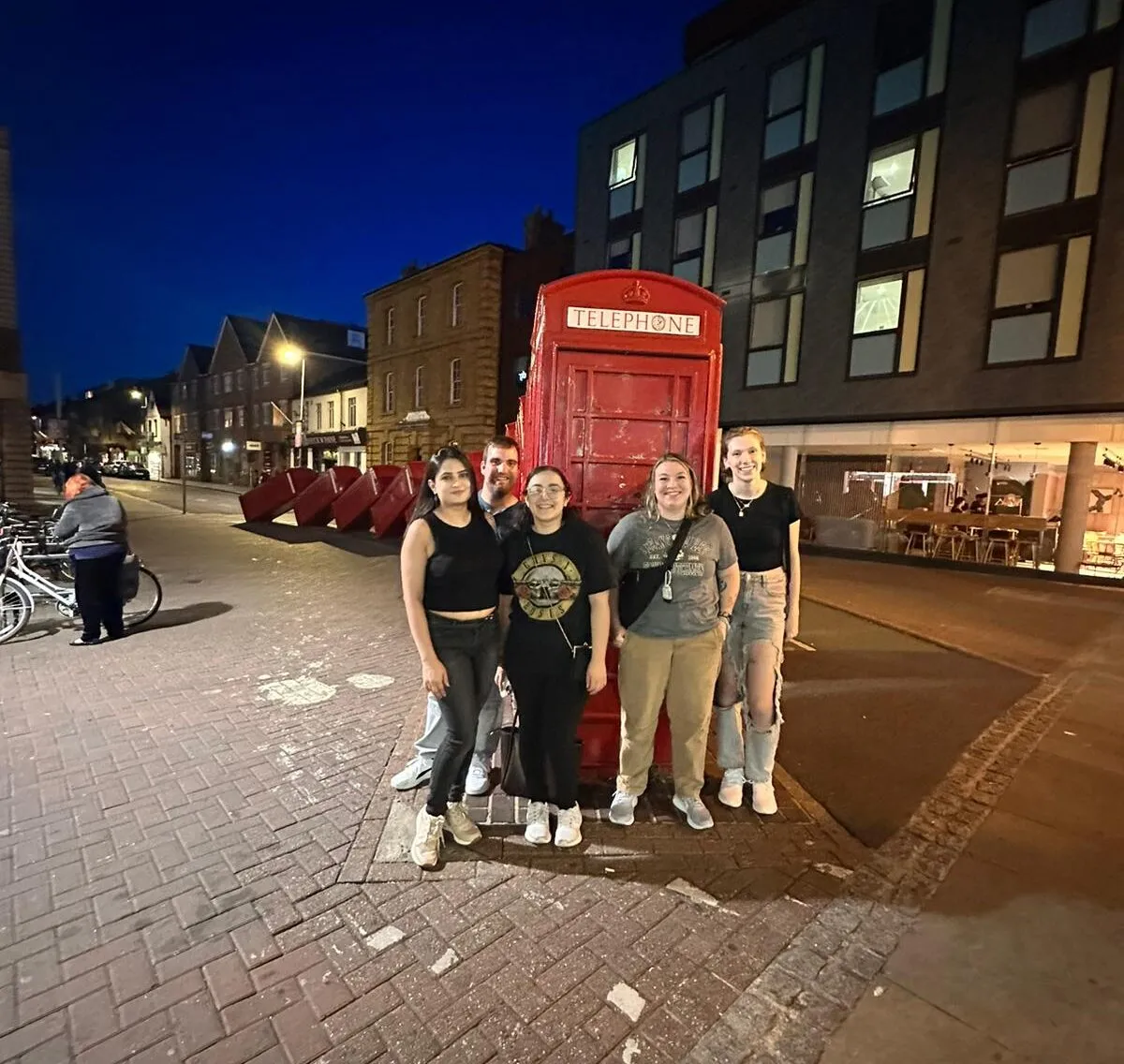 LVC students stand in front of phone booth in London, Fall 2023