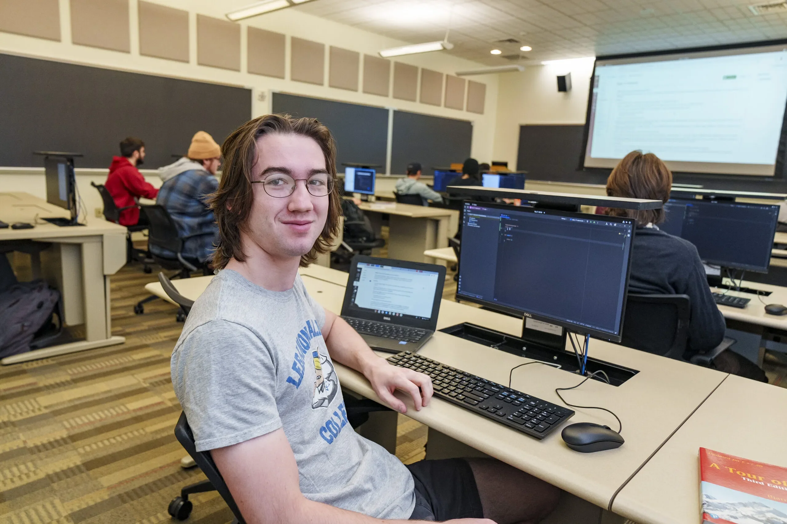 Student sits in LVC computer programming class.